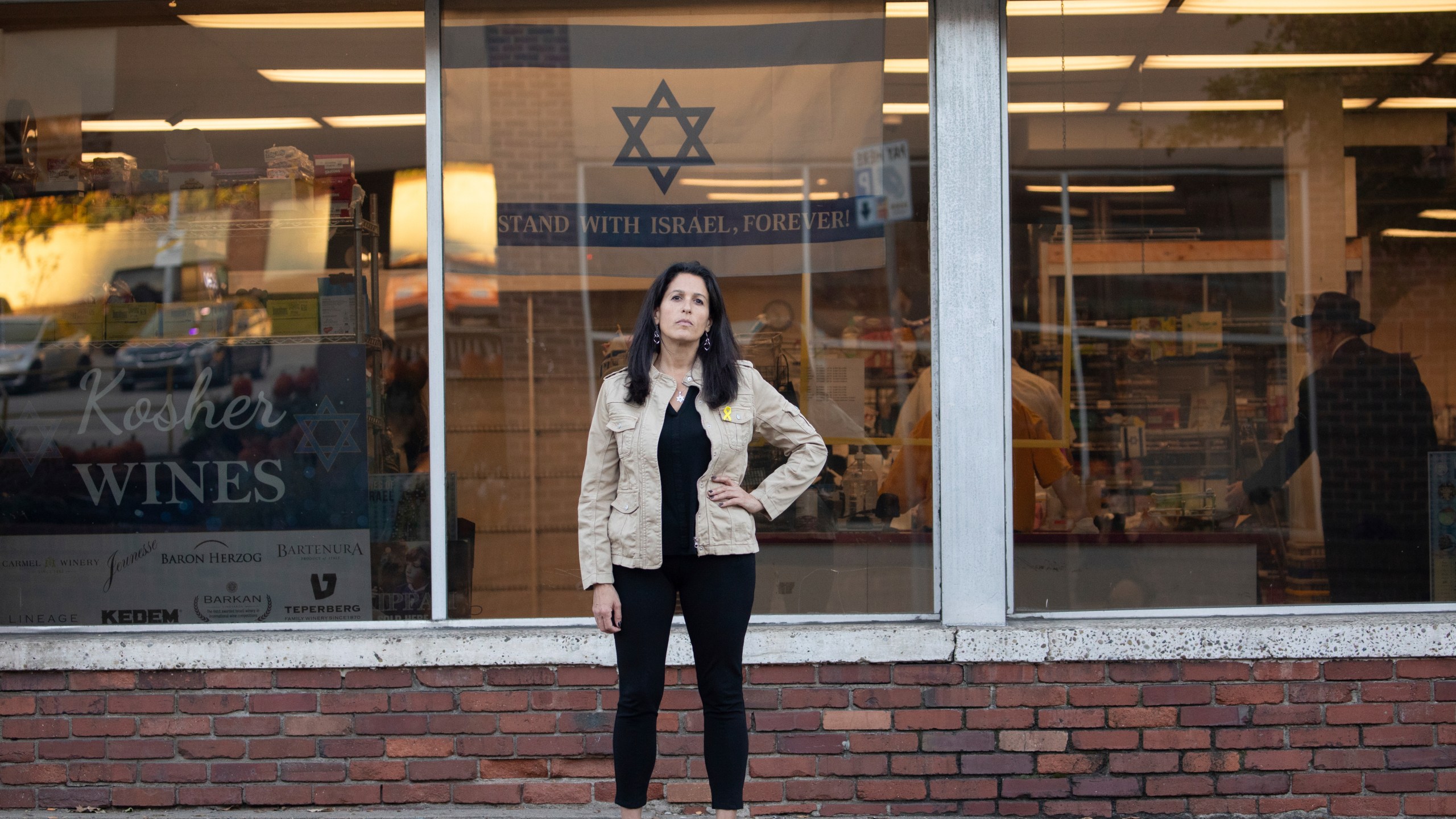 Rona Kaufman, a self-described progressive who is conflicted over who she will vote for in the presidential election, poses for a portrait in Squirrel Hill, a heavily Jewish neighborhood in Pittsburgh, Saturday, Oct. 20, 2024. (AP Photo/Rebecca Droke)