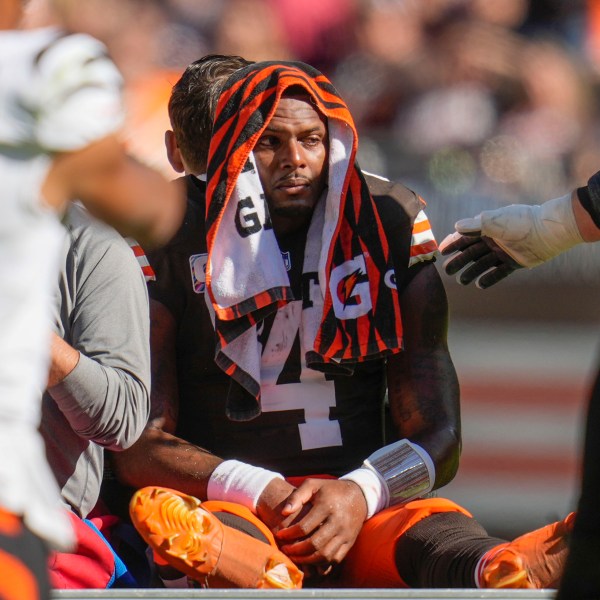 Cleveland Browns quarterback Deshaun Watson (4) is carted off the field after being injured in the first half of an NFL football game against the Cincinnati Bengals, Sunday, Oct. 20, 2024, in Cleveland. (AP Photo/Sue Ogrocki)