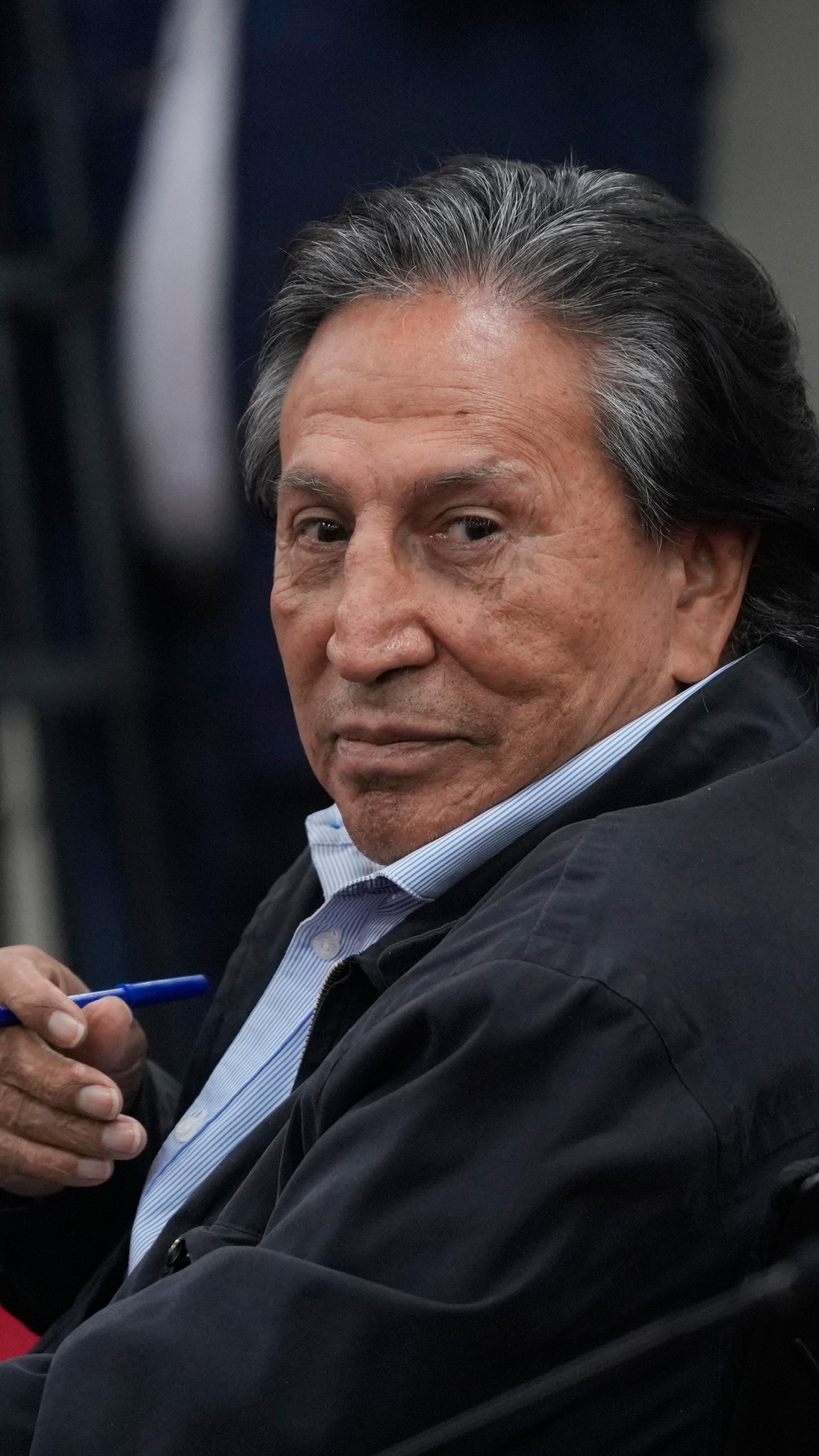 Former Peruvian President Alejandro Toledo attends a court session where the judge will rule in his corruption case in Lima, Peru, Monday, Oct. 21, 2024. (AP Photo/Guadalupe Pardo)