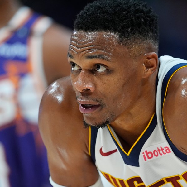 Denver Nuggets guard Russell Westbrook waits for play to resume in the second half of an NBA preseason game against the Phoenix Suns, Sunday, Oct. 13, 2024, in Denver. (AP Photo/David Zalubowski)