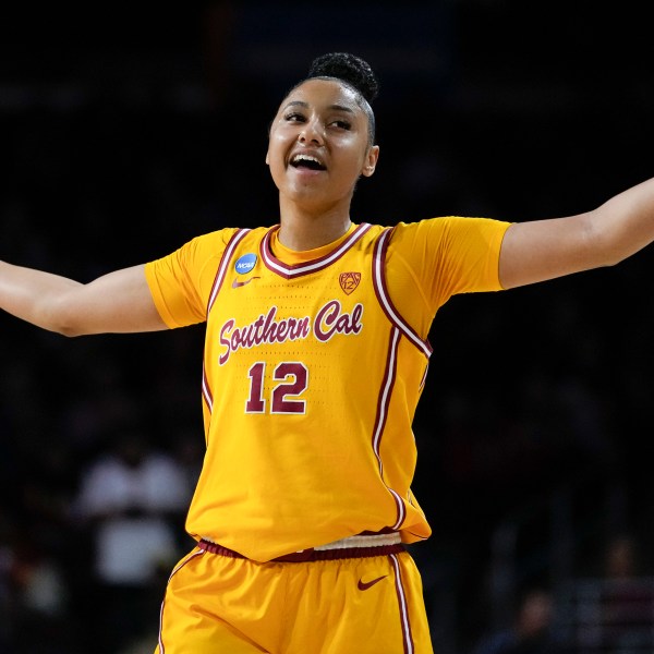 FILE - Southern California guard JuJu Watkins reacts after a shot during a second-round college basketball game against Kansas in the women's NCAA Tournament in Los Angeles, Monday, March 25, 2024. (AP Photo/Ashley Landis, File)