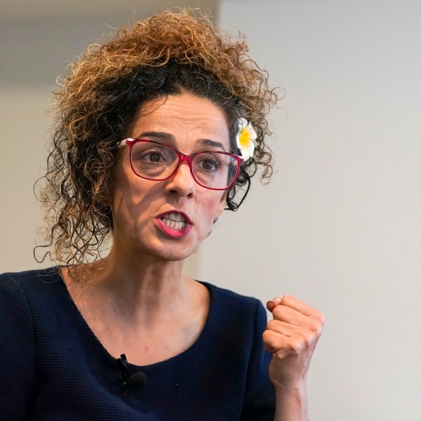 FILE - Iranian dissident Masih Alinejad answers questions during an interview with The Associated Press, Friday, Sept. 23, 2022, in New York. (AP Photo/Mary Altaffer, File)