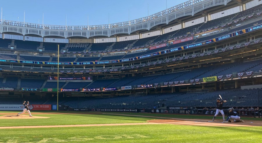 New York Yankees' Nester Cortes throws batting practice to Yankees' Austin Wells, Tuesday, Oct. 22, 2024. (AP Photo/Rom Blum)