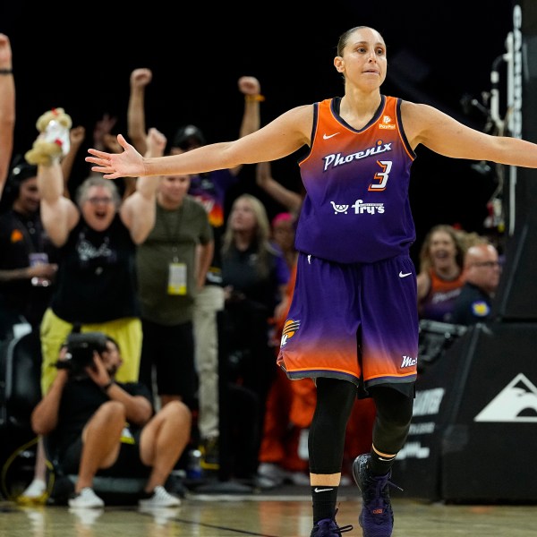 FILE - Phoenix Mercury's Diana Taurasi (3) celebrates after making her 10,000th career point, during the second half of a WNBA basketball game against the Atlanta Dream, Thursday, Aug. 3, 2023, in Phoenix.(AP Photo/Matt York)