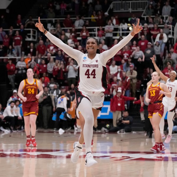 FILE - Then-Stanford forward Kiki Iriafen celebrates during a second-round college basketball game in the women's NCAA Tournament against Iowa State in Stanford, Calif., Sunday, March 24, 2024. (AP Photo/Jeff Chiu, File)