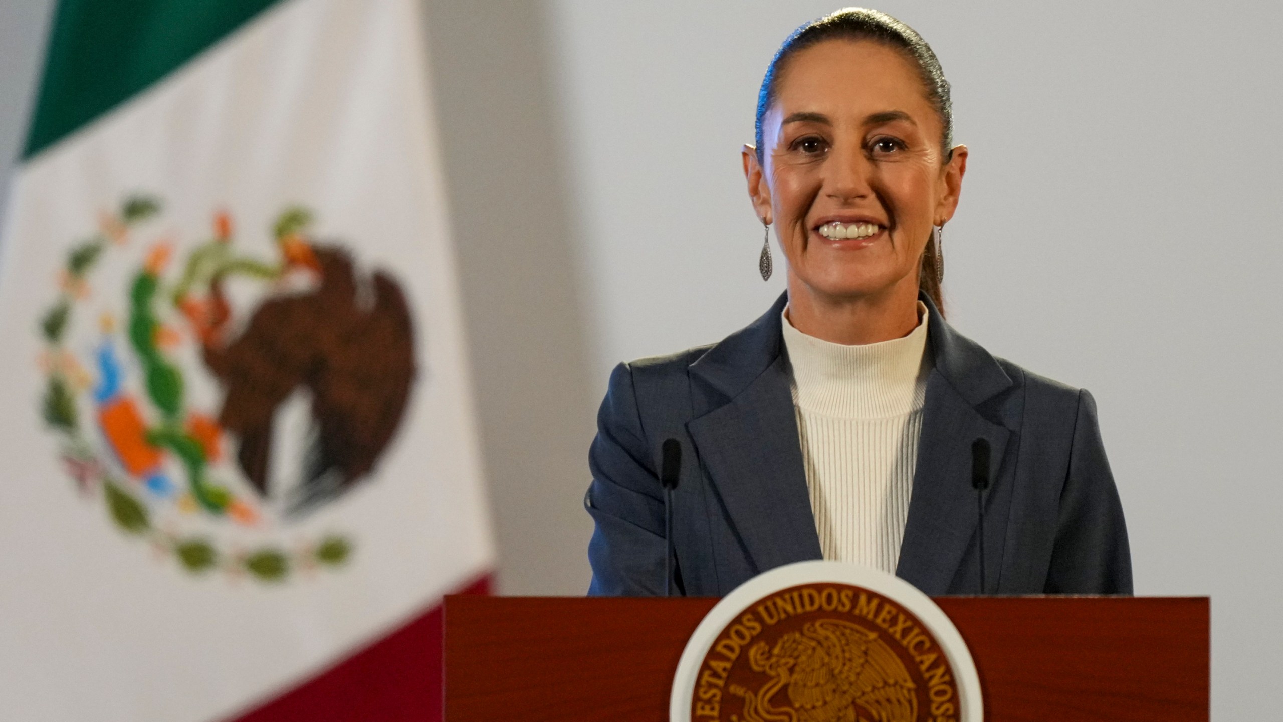 FILE - Mexican President Claudia Sheinbaum gives a media briefing from the National Palace in Mexico City, Wednesday, Oct. 2, 2024, the morning after her inauguration. (AP Photo/Fernando Llano, File)