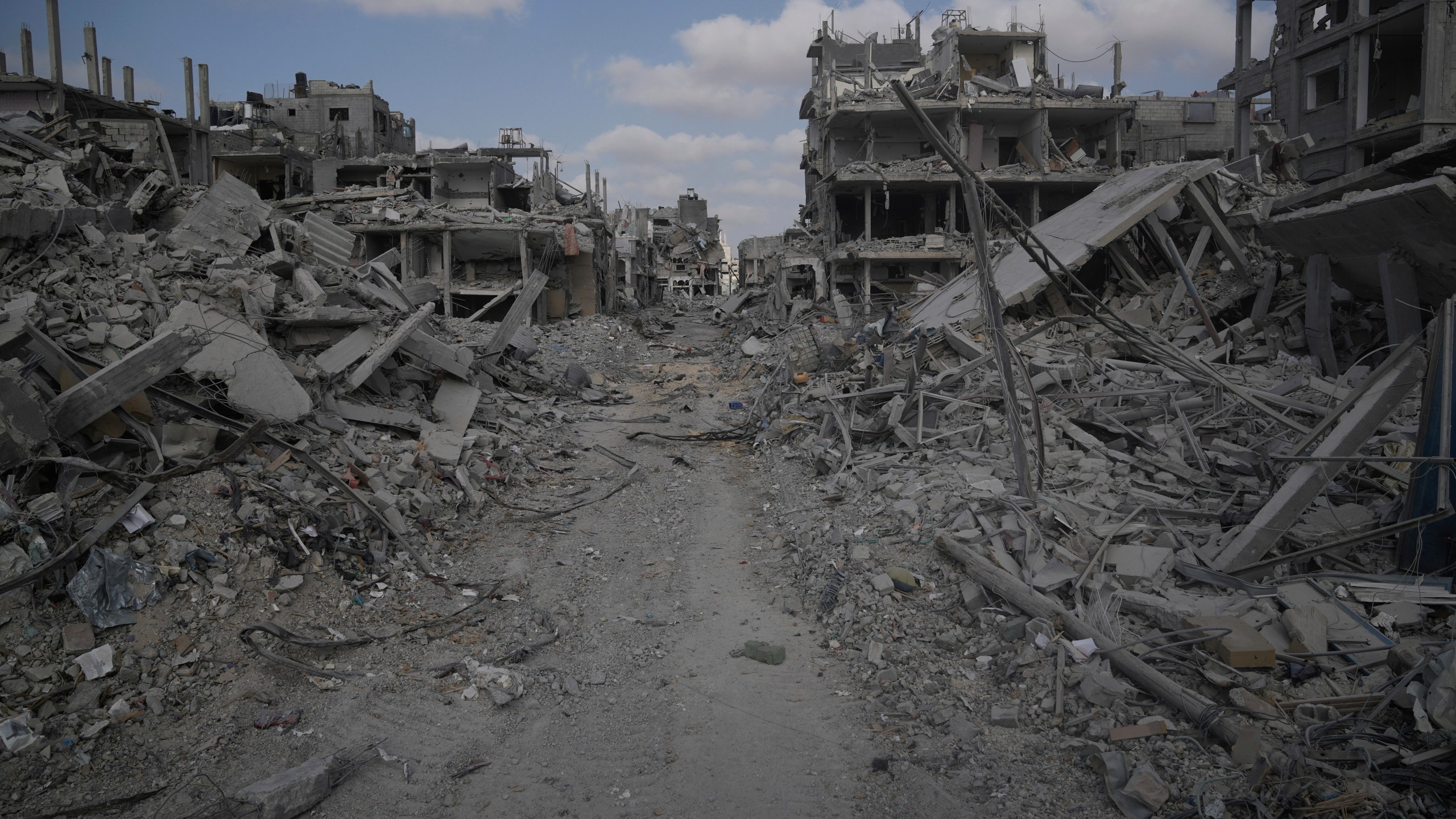 FILE - A view of destroyed buildings is shown following Israeli strikes in the southern Gaza Strip on Sept. 13, 2024. (AP Photo/Leo Correa, File)