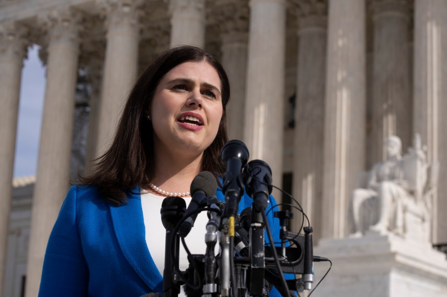 FILE - Colorado Secretary of State Jena Griswold speaks in front of the U.S. Supreme Court, Feb. 8, 2024, in Washington. (AP Photo/Manuel Balce Ceneta, File)