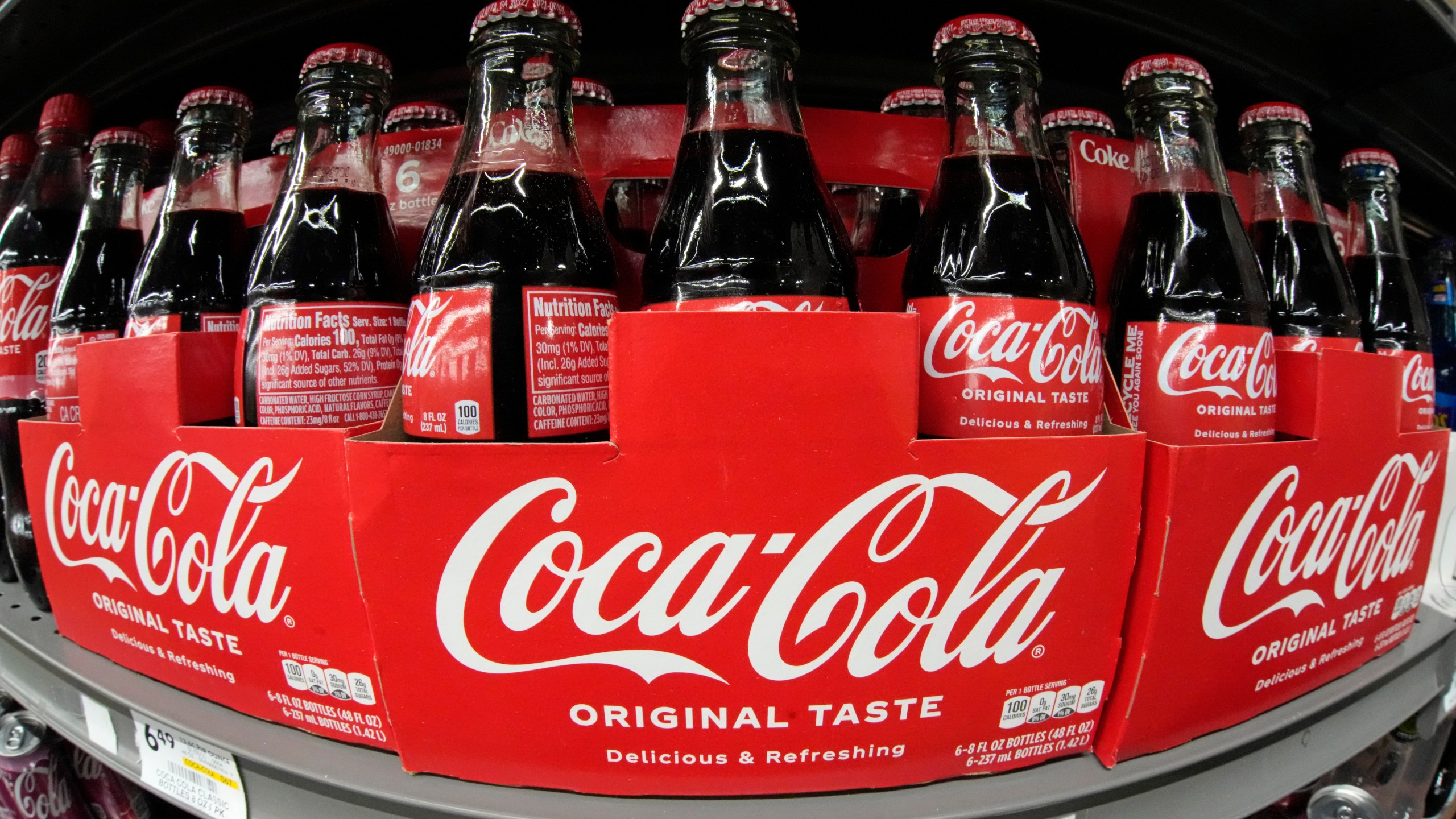 FILE - Coca Cola is displayed in a market in Pittsburgh on Jan. 26, 2023. (AP Photo/Gene J. Puskar, File)