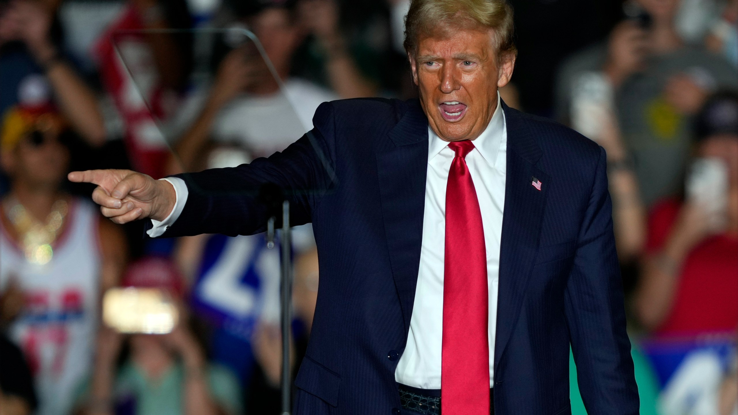 Republican presidential nominee former President Donald Trump gestures to supporters at a campaign rally at Greensboro Coliseum, Tuesday, Oct. 22, 2024, in Greensboro, N.C. (AP Photo/Julia Demaree Nikhinson)