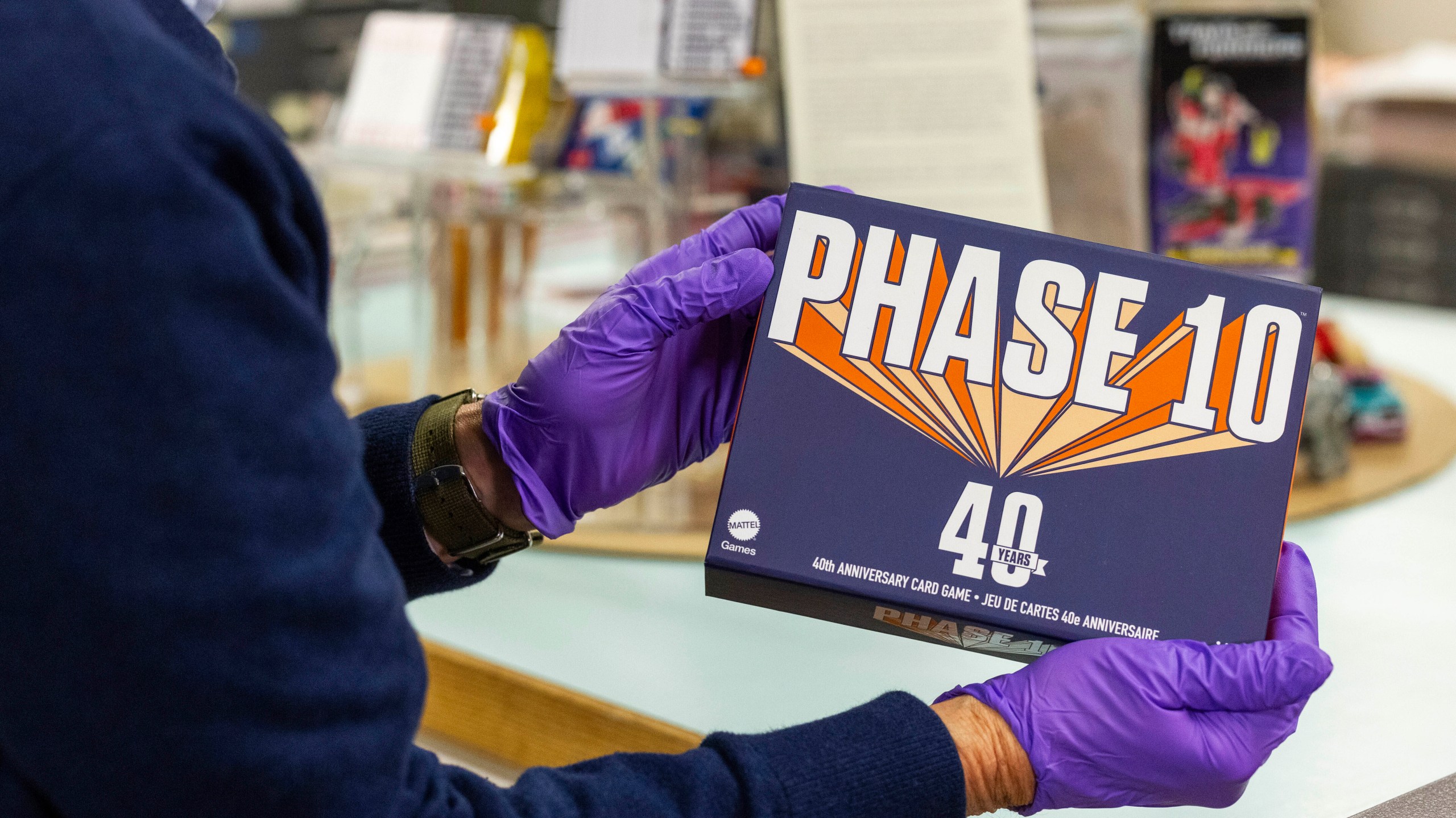 Christopher Bensch, chief curator at The Strong National Museum of Play, holds one of the games that is a finalist for the 2024 Toy Hall of Fame, Tuesday, Oct. 15, 2024, in Rochester, N.Y. (AP Photo/Lauren Petracca)