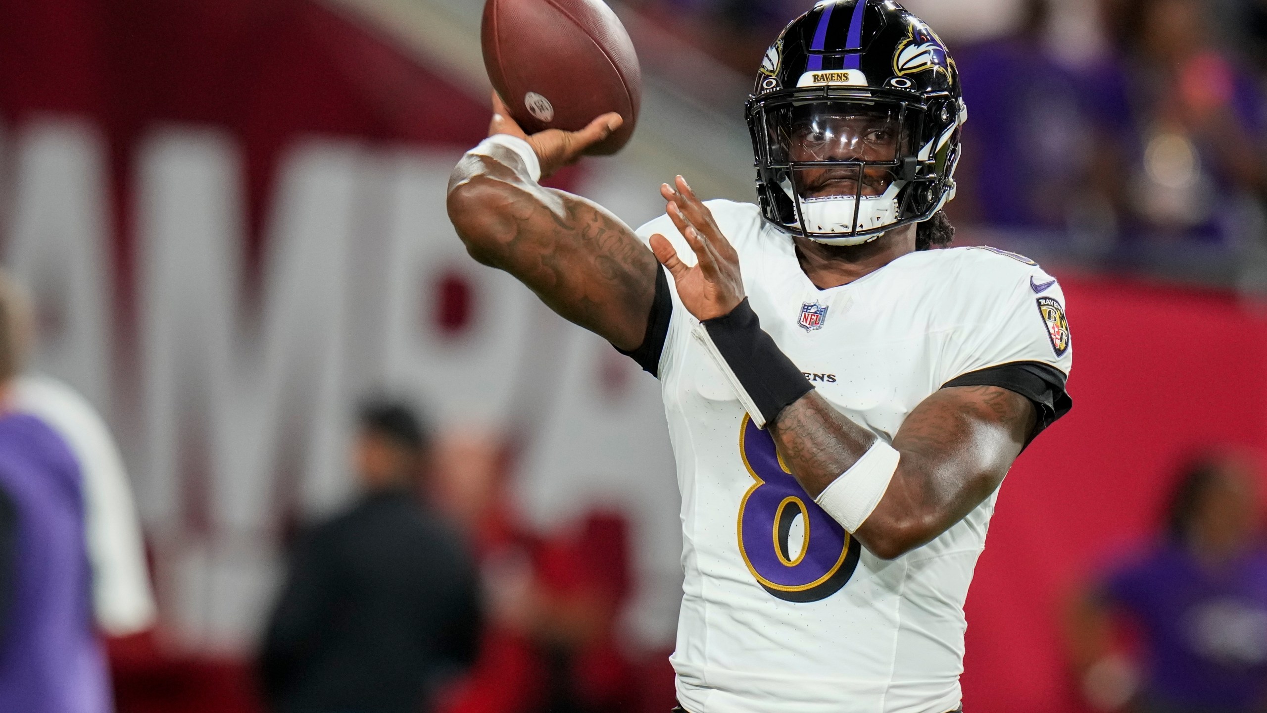 Baltimore Ravens quarterback Lamar Jackson (8) warms up before an NFL football game against the Tampa Bay Buccaneers, Monday, Oct. 21, 2024, in Tampa, Fla. (AP Photo/Chris O'Meara)