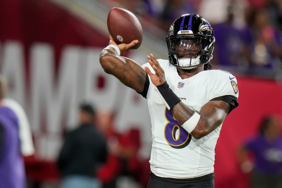 Baltimore Ravens quarterback Lamar Jackson (8) warms up before an NFL football game against the Tampa Bay Buccaneers, Monday, Oct. 21, 2024, in Tampa, Fla. (AP Photo/Chris O'Meara)