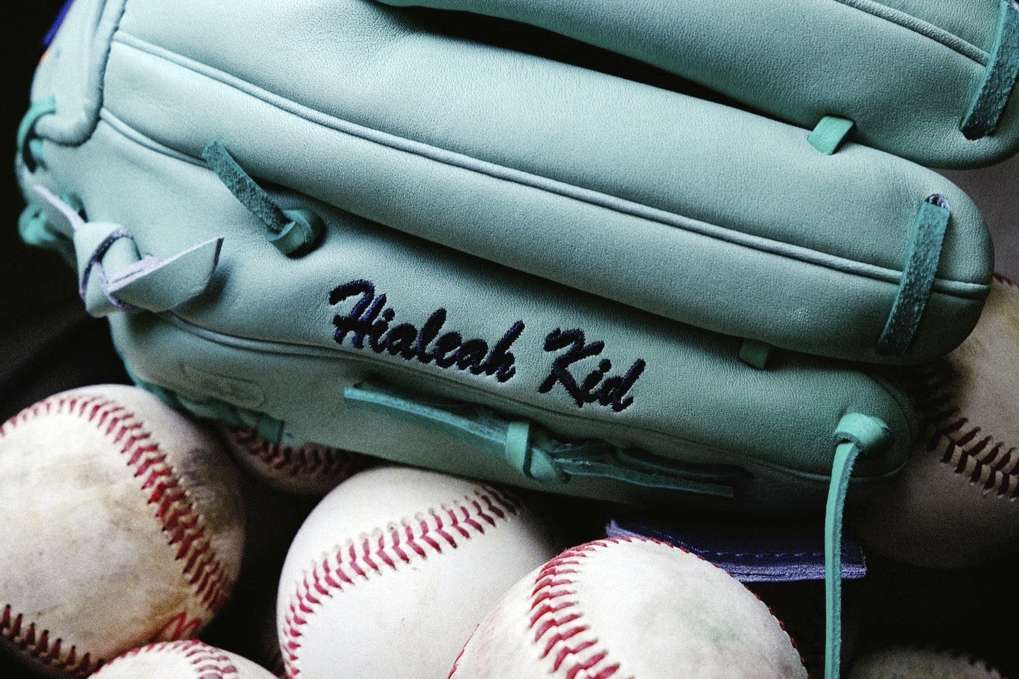 This image provided by Brent Habert, shows New York Yankees' Nestor Cortes' mint-colored costumed designed baseball glove. (Brent Habert via AP)