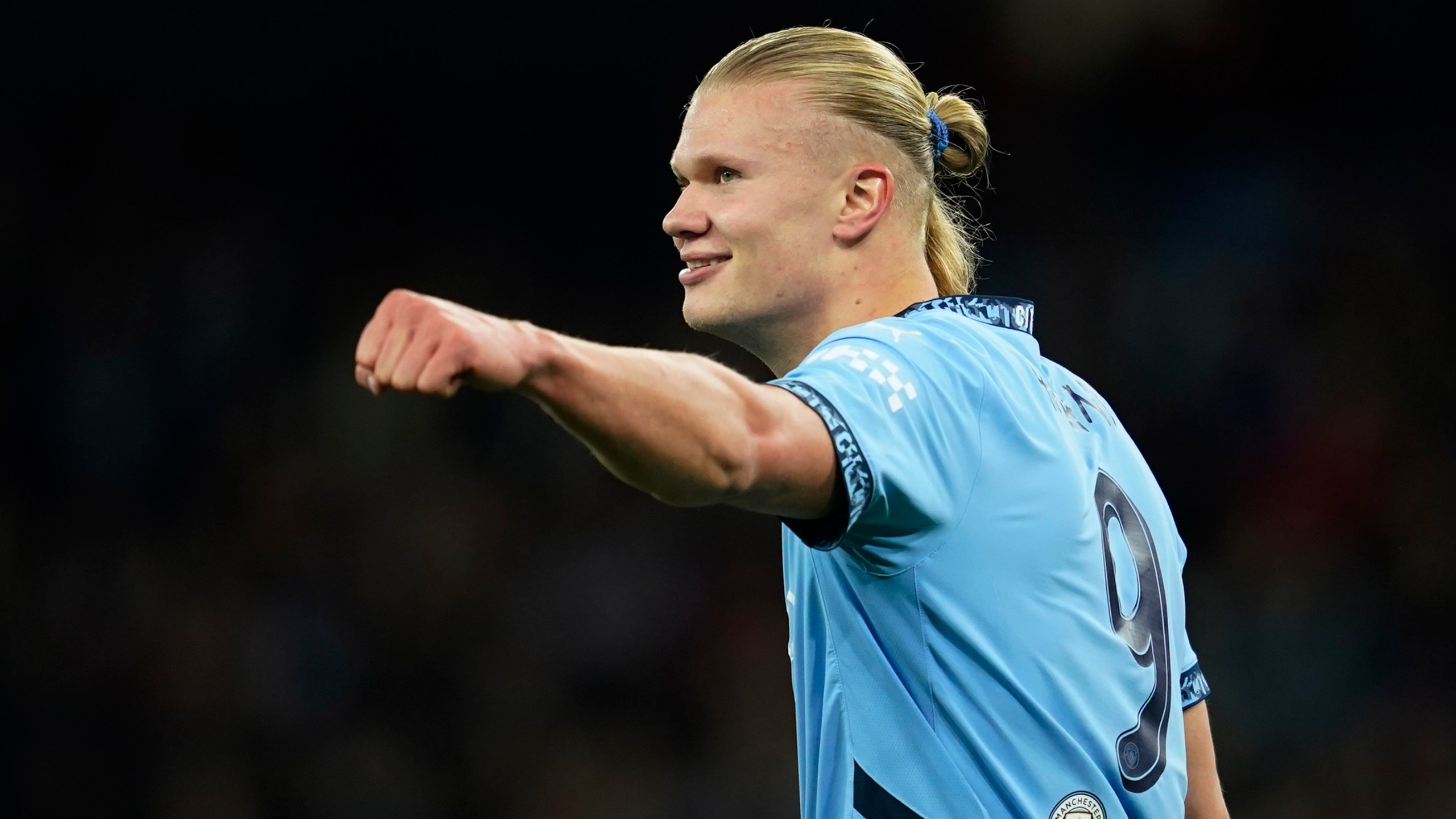 Manchester City's Erling Haaland celebrates after scoring his side's second goal during the Champions League opening phase soccer match between Manchester City and Sparta Praha at the Etihad Stadium in Manchester, England, Wednesday, Oct.23 , 2024. (AP Photo/Dave Thompson)