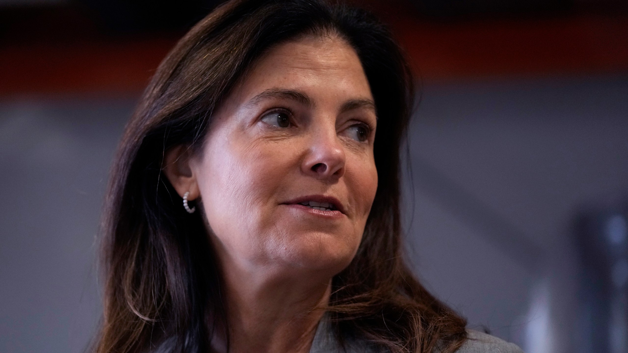 Republican gubernatorial candidate Kelly Ayotte, who faces Democrat Joyce Craig in the November 2024 election, answers a question during a visit to a local concrete coating business, Wednesday, Oct. 16, 2024, in Manchester, N.H. (AP Photo/Charles Krupa)