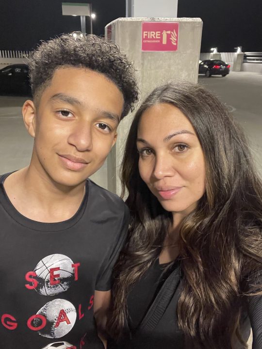 In this undated photo provided by Megan Garcia of Florida in October 2024, she stands with her son, Sewell Setzer III. (Megan Garcia via AP)