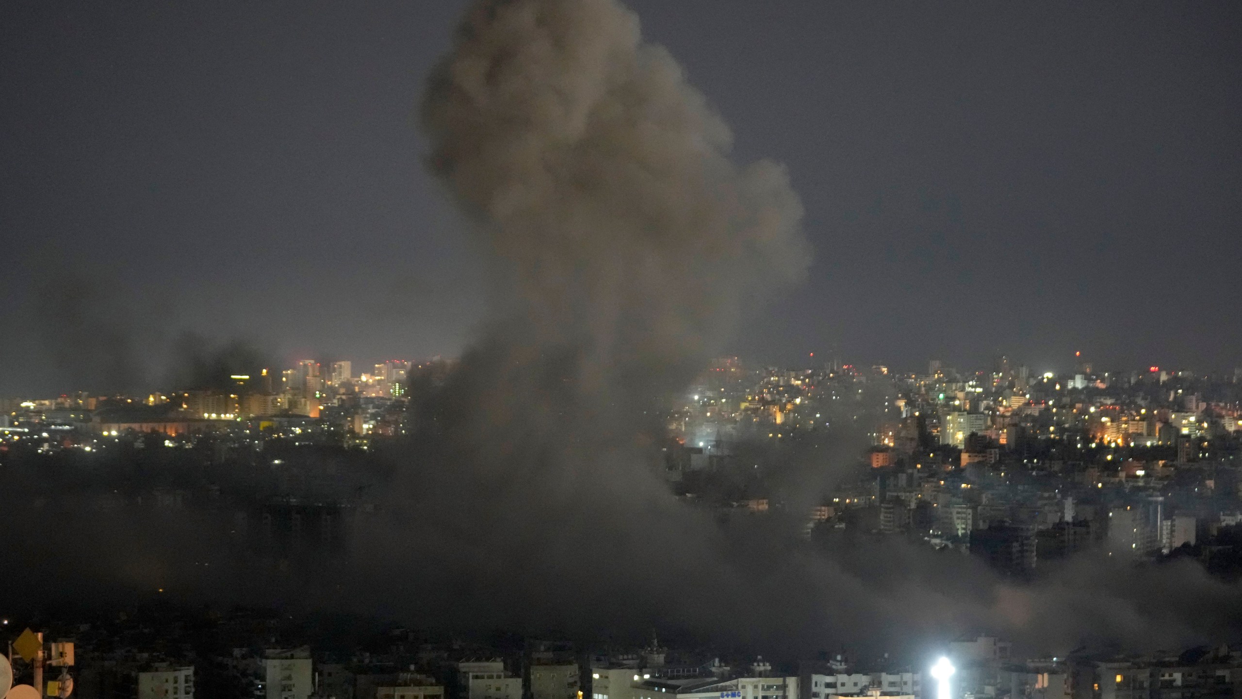 Smoke rises from an Israeli airstrike on Dahiyeh, in the southern suburb of Beirut, Lebanon, early Friday, Oct. 25, 2024. (AP Photo/Hussein Malla)