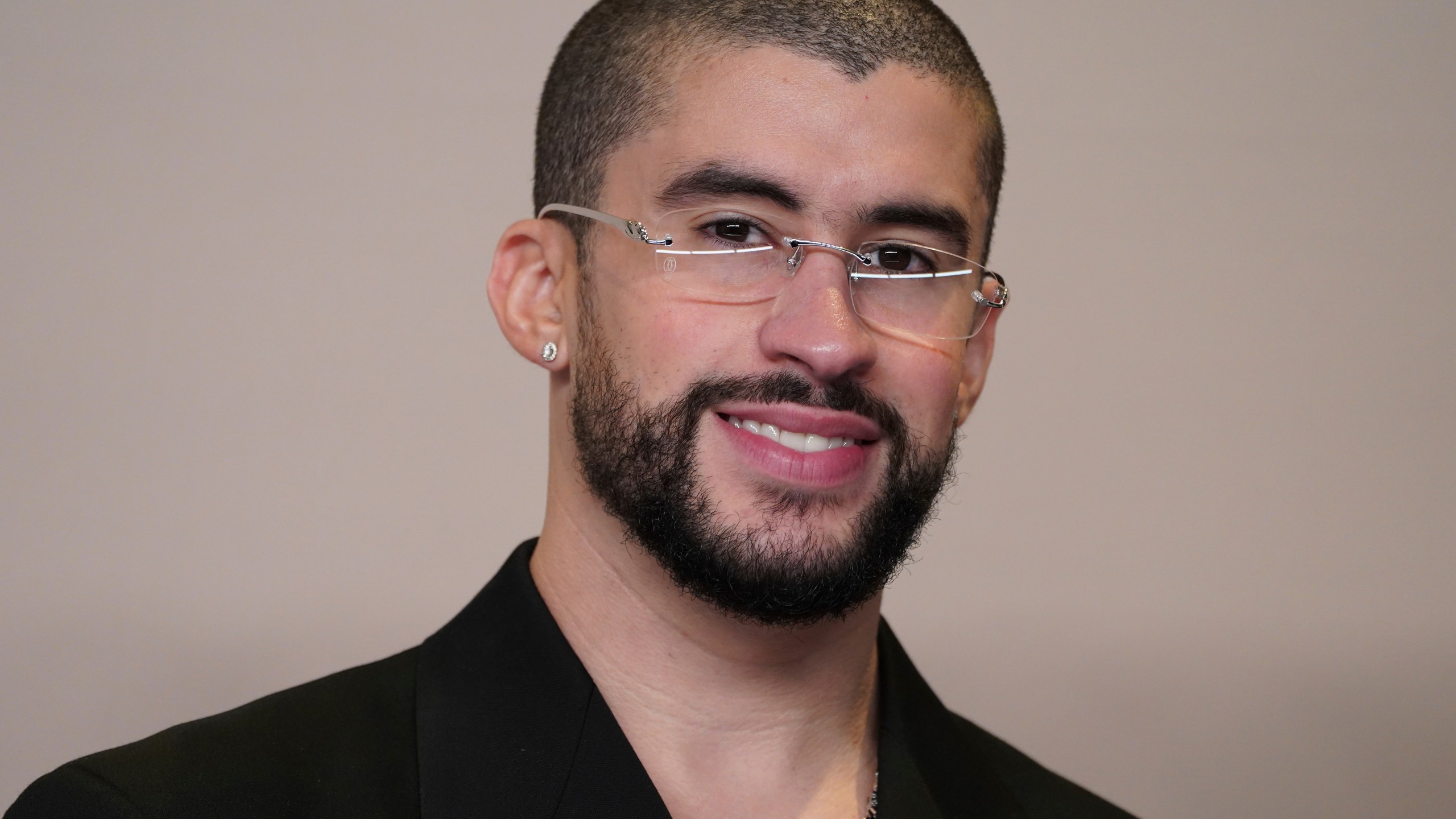 FILE - Bad Bunny poses in the press room at the Oscars on Sunday, March 10, 2024, at the Dolby Theatre in Los Angeles. (Photo by Jordan Strauss/Invision/AP, File)