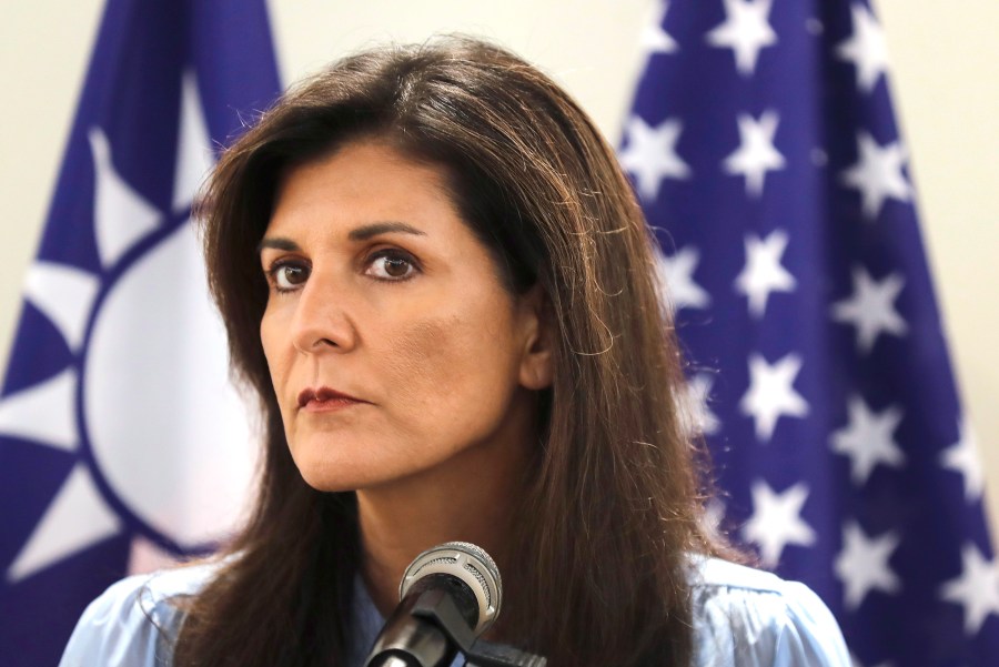 FILE - Nikki Haley, former United States Ambassador to the United Nations, listens to media during her press conference before leaving Taipei, Taiwan, Aug. 24, 2024. (AP Photo/Chiang Ying-ying, File)