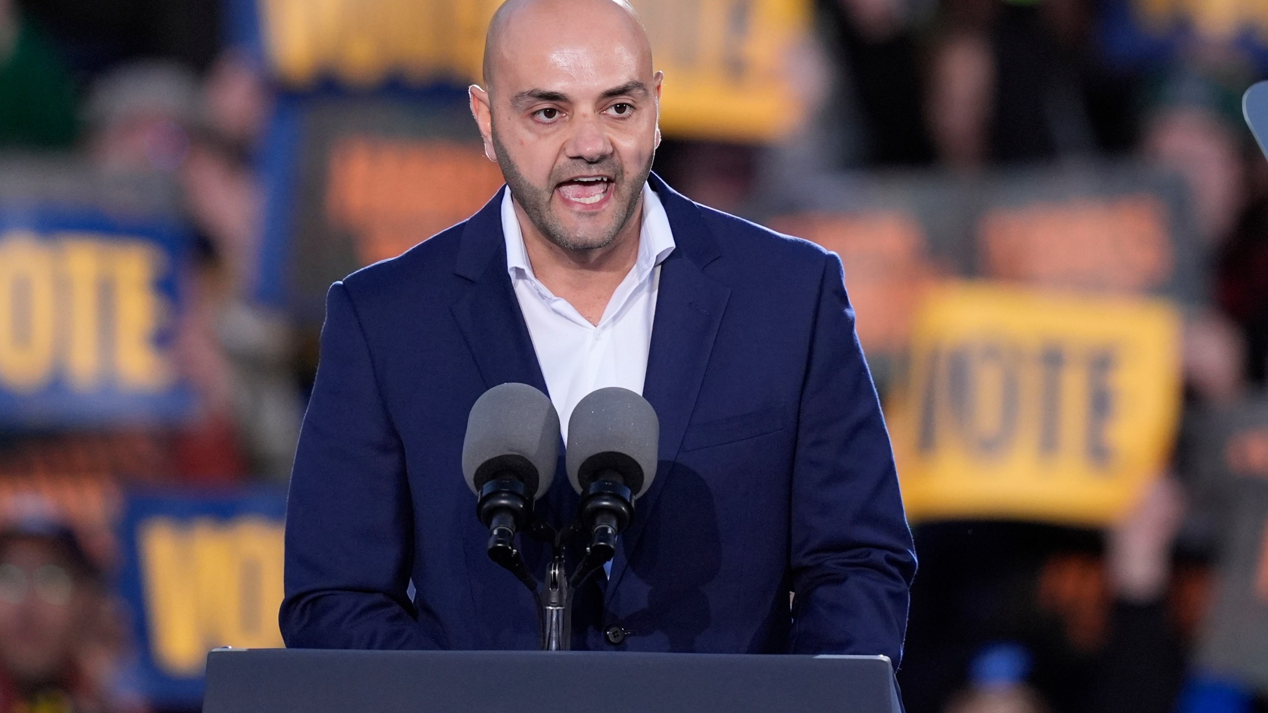 Assad Turfe, of Dearborn, Mich., speaks at a campaign rally for Democratic presidential nominee Vice President Kamala Harris at Burns Park in Ann Arbor, Mich., Monday, Oct. 28, 2024. (AP Photo/Carlos Osorio)