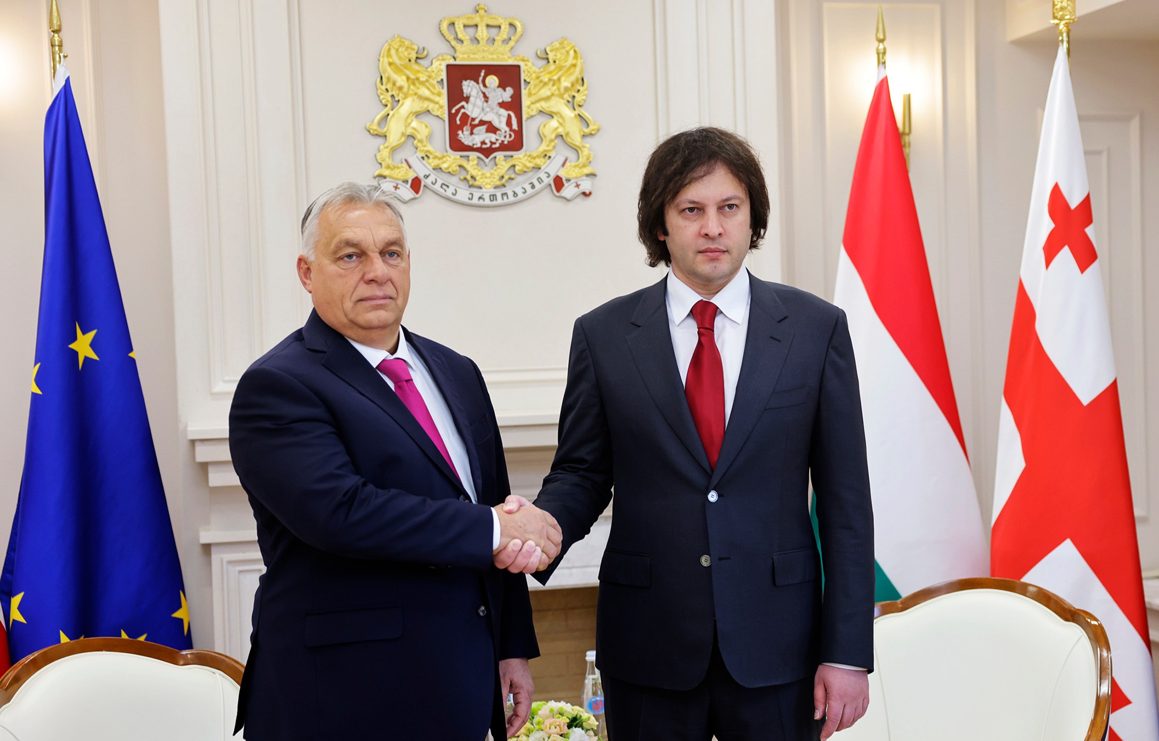 In this photo released by Georgian Prime Minister Press Office on Tuesday, Oct. 29, 2024, Georgian Prime Minister Irakli Kobakhidze, right, and Prime Minister of Hungary Viktor Orban shake hands during their meeting in Tbilisi, Georgia. (Georgian Prime Minister Press Office via AP)