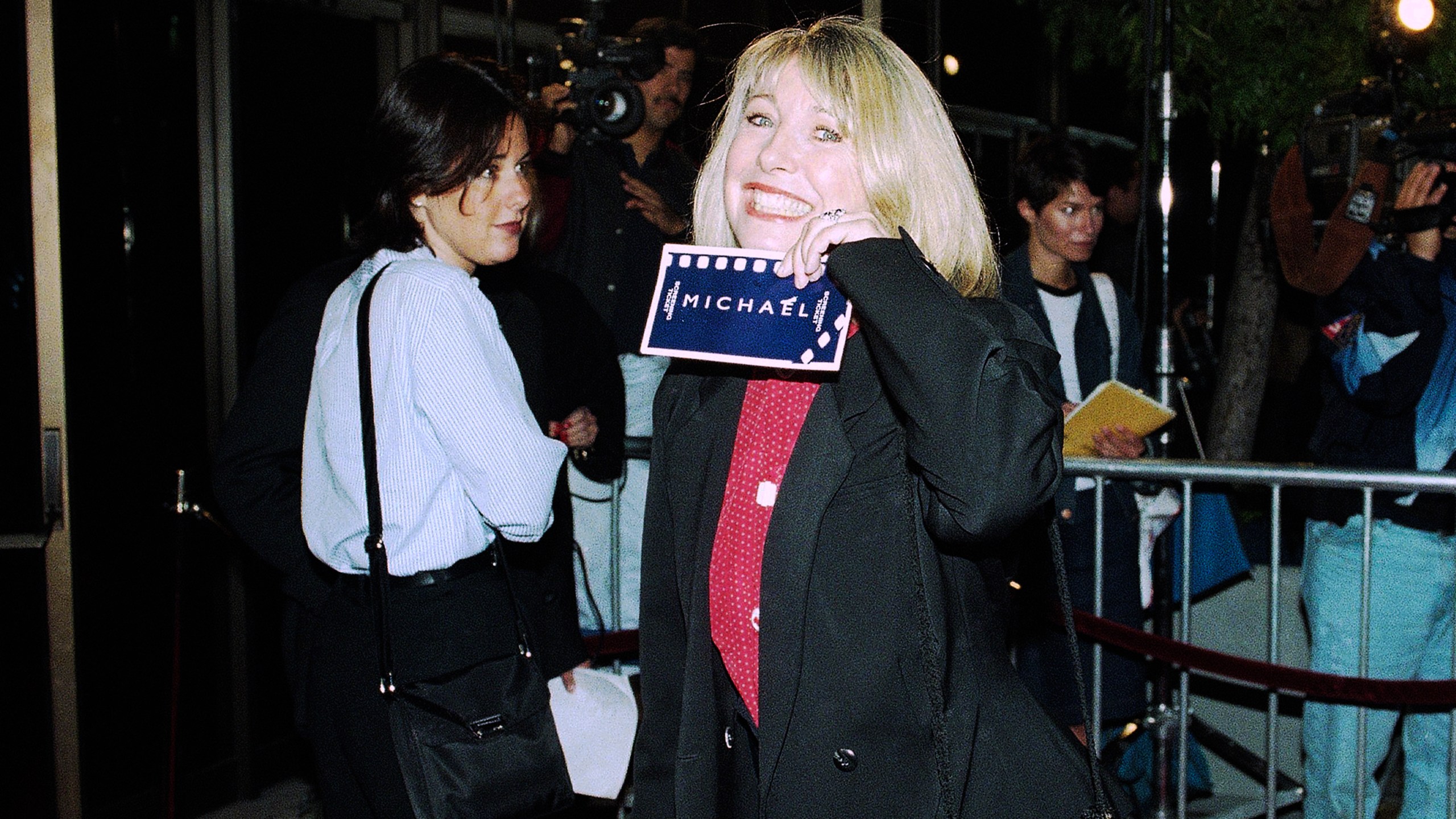 Actress Teri Garr shows off her ticket at the premiere of ?Michael," Dec. 19, 1996 in Beverly Hills, Calif. The film co-stars Garr and stars John Travolta along with William Hurt, Robert Pastorelli and Jean Stapleton. (AP Photo/Mark J. Terrill)