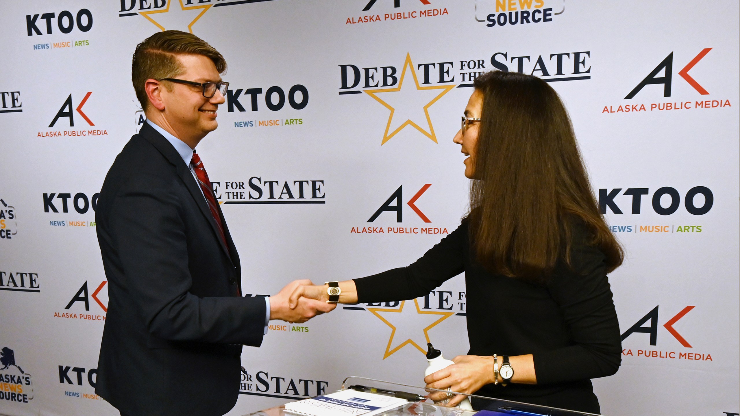 Republican U.S. House candidate Nick Begich and incumbent Democratic Rep. Mary Peltola shake hands after a debate at Alaska Public Media on Thursday evening, Oct. 10, 2024. (Bill Roth/Anchorage Daily News via AP)