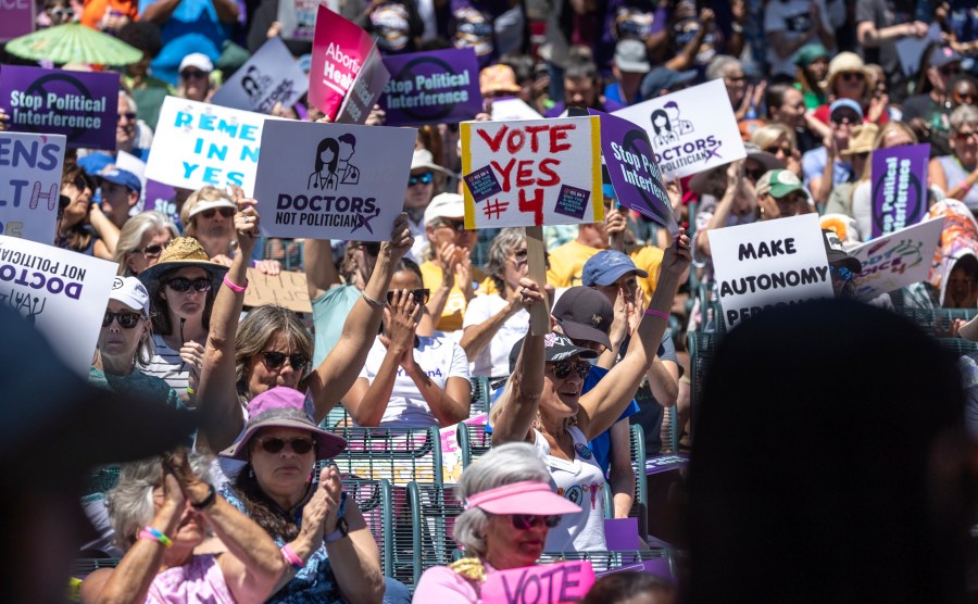 FILE - Abortion rights advocates hold a rally in support of the "Yes On 4" campaign in downtown Orlando, Fla., April 13, 2024. (Willie J. Allen Jr./Orlando Sentinel via AP, File)