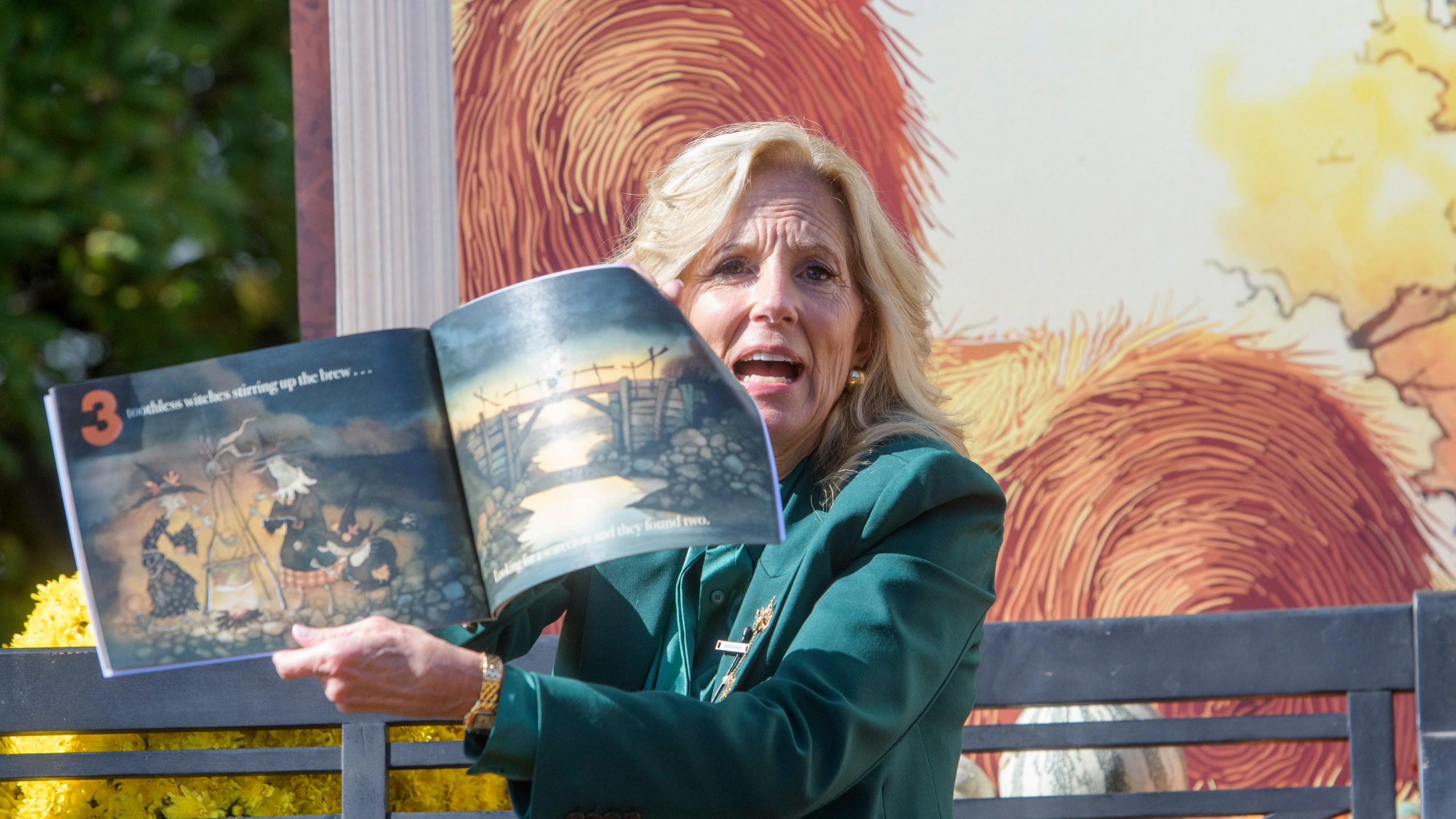 First lady Jill Biden participates in a "Hallo-READ" story-time session by reading the book "10 Spooky Pumpkins" by Gris Grimly to children on the South Lawn of the White House in Washington, Wednesday, Oct. 30, 2024. (AP Photo/Rod Lamkey, Jr.)