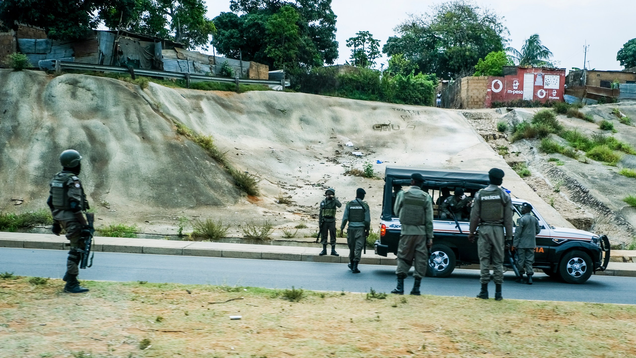 Mozambican police deploys in the streets of Maputo, Mozambique, Monday, Oct. 21, 2024, during a nationwide shutdown protest following a disputed Oct. 9 election. (AP Photo/Carlos Uqueio)