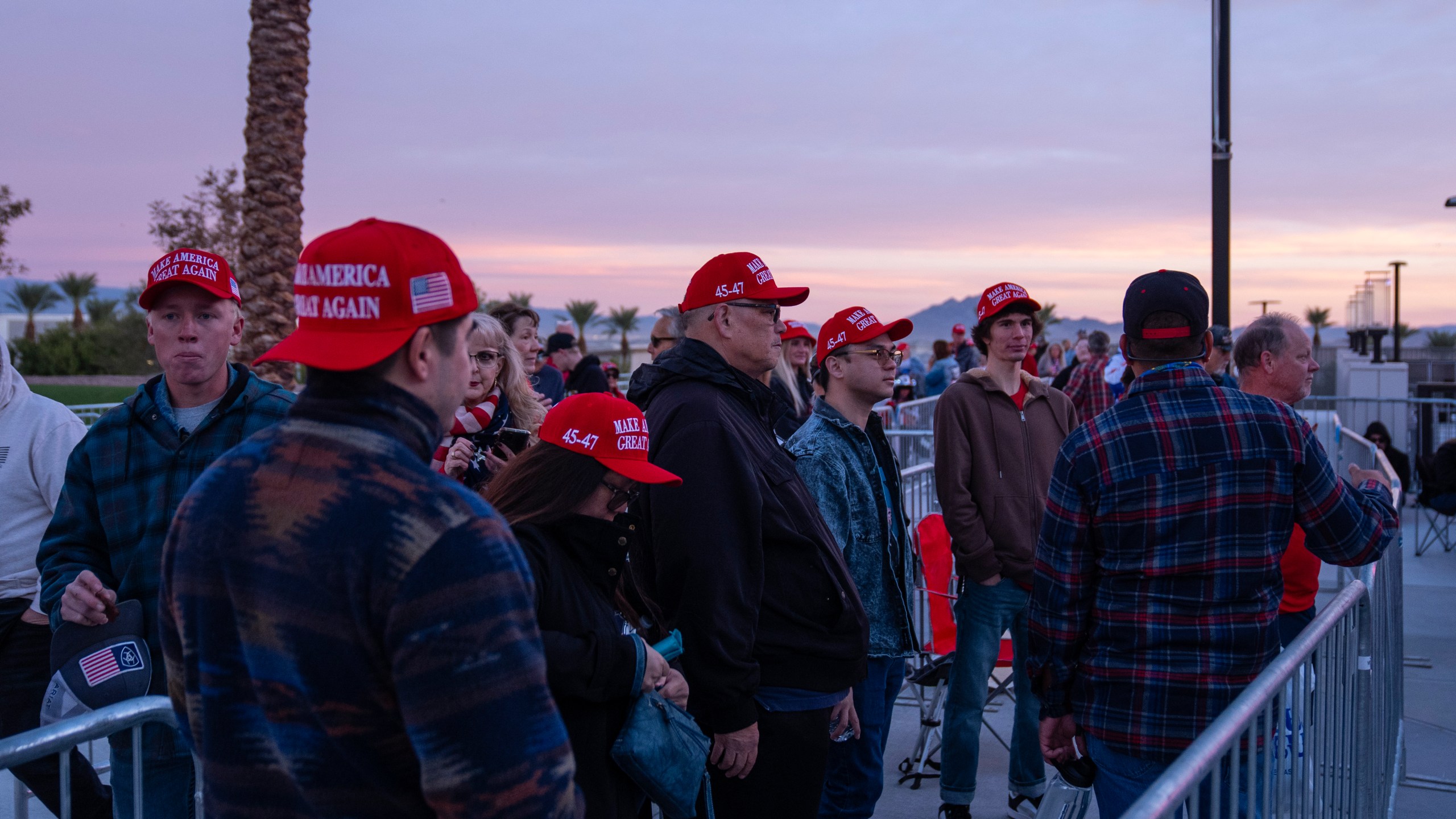 People wait in line for a campaign rally for Republican presidential nominee former President Donald Trump at Lee's Family Forum, Thursday, Oct. 31, 2024, in Henderson, Nev. (AP Photo/Evan Vucci)