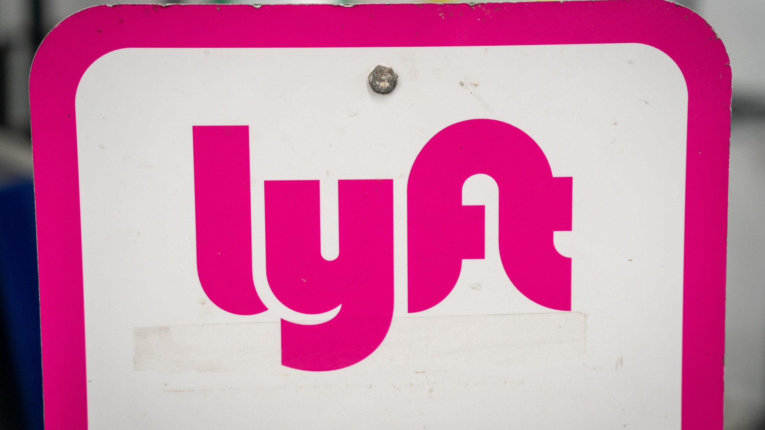 Lyft signage at a vehicle rental location in San Francisco, California, US, on Thursday, Feb. 8, 2024.