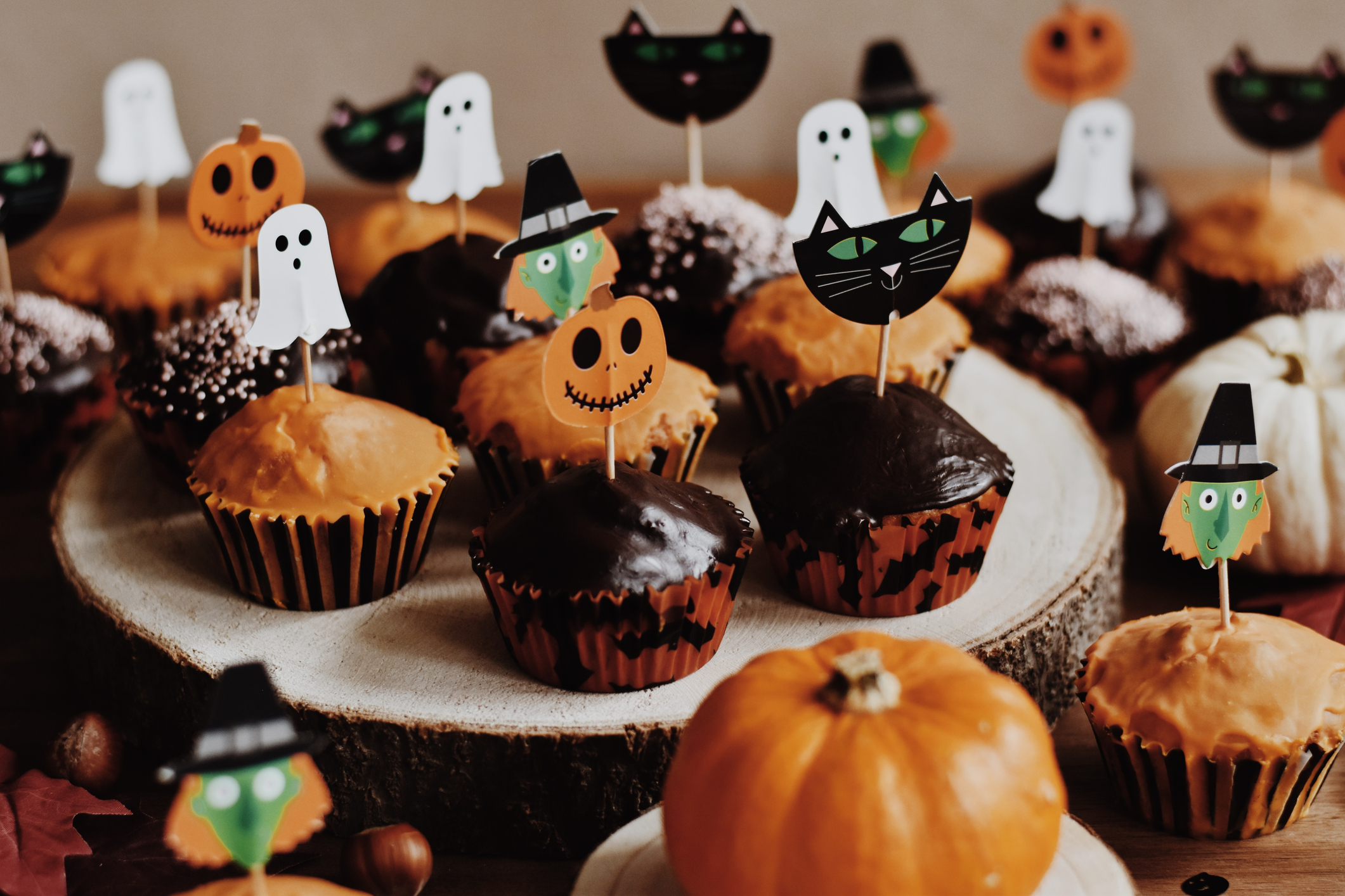 Close-up of home-made Halloween cupcakes on a table.