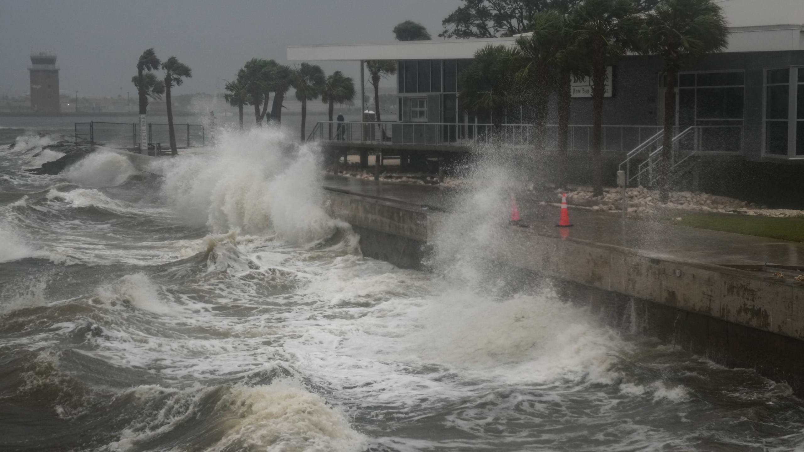 Waves crash along St. Pete Pier in St. Petersburg, Florida, as Hurricane Milton is expected to make landfall tonight on October 9, 2024.