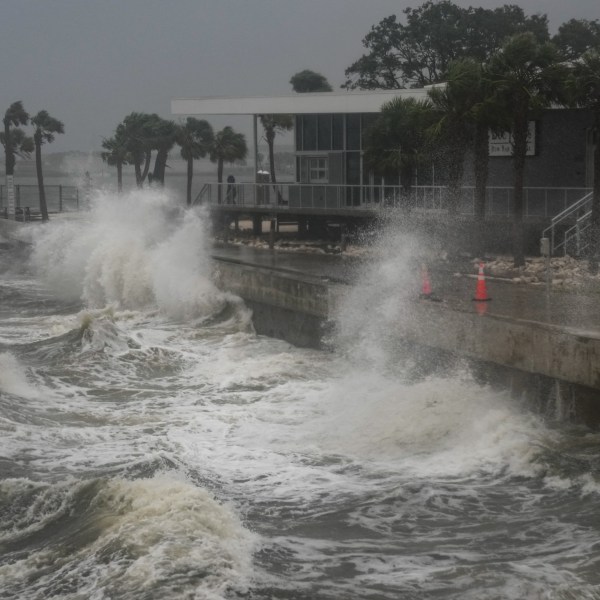 Waves crash along St. Pete Pier in St. Petersburg, Florida, as Hurricane Milton is expected to make landfall tonight on October 9, 2024.