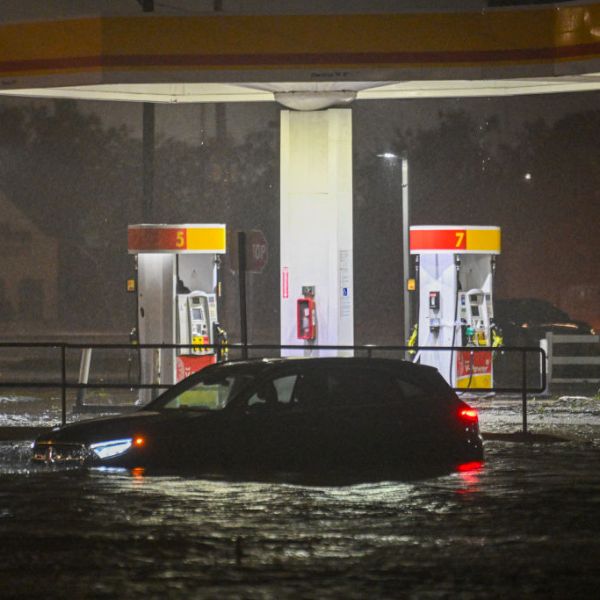 A vehicle is stranded on a water-flooded street after Hurricane Milton made landfall in Brandon, Florida on October 9, 2024.