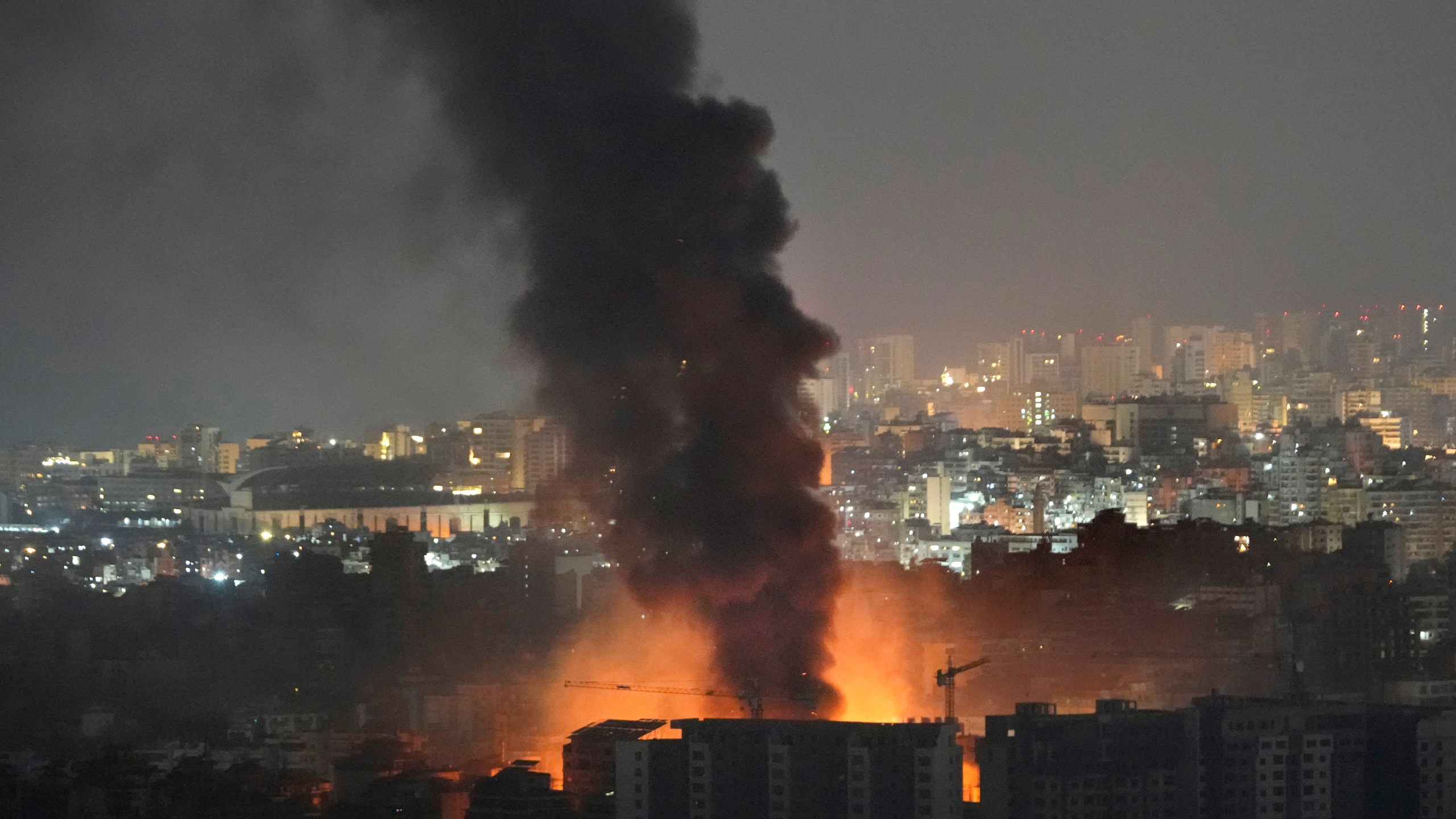 Flame and smoke rise from Israeli airstrikes on Dahiyeh, in the southern suburb of Beirut, Lebanon, early Friday, Nov. 1, 2024. (AP Photo/Hussein Malla)