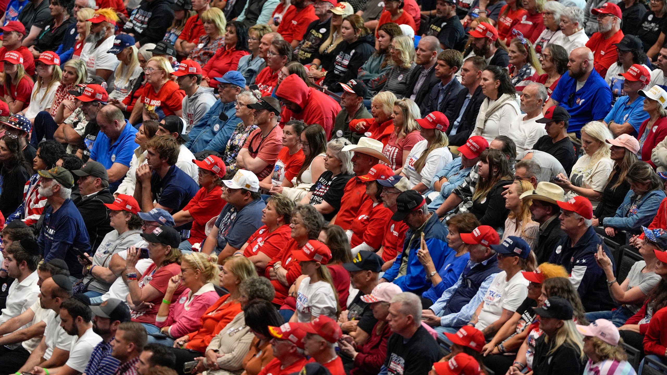 Supporters listen as Republican presidential nominee former President Donald Trump speaks at a campaign rally at Rocky Mount Event Center, Wednesday, Oct. 30, 2024, in Rocky Mount, N.C. (AP Photo/Julia Demaree Nikhinson)