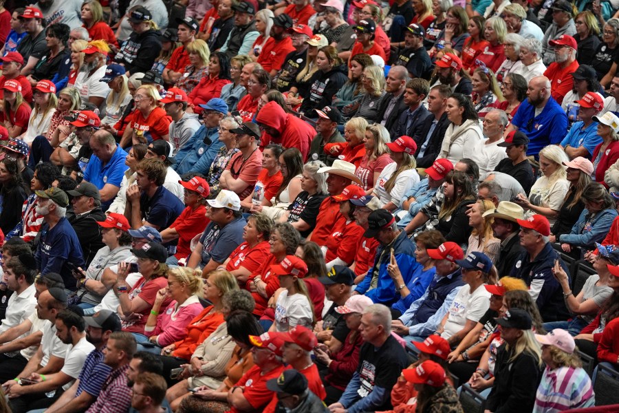 Supporters listen as Republican presidential nominee former President Donald Trump speaks at a campaign rally at Rocky Mount Event Center, Wednesday, Oct. 30, 2024, in Rocky Mount, N.C. (AP Photo/Julia Demaree Nikhinson)