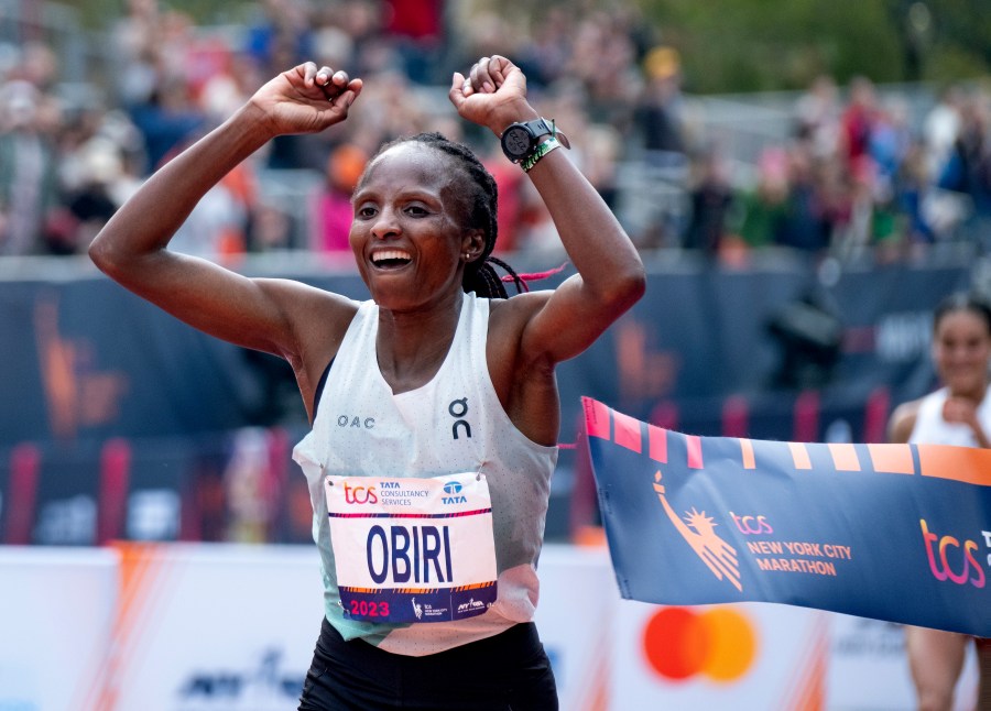 FILE - Hellen Obiri of Kenya crosses the finish line to win the women's division of the New York City Marathon, Sunday, Nov. 5, 2023, in New York.(AP Photo/Craig Ruttle, File)