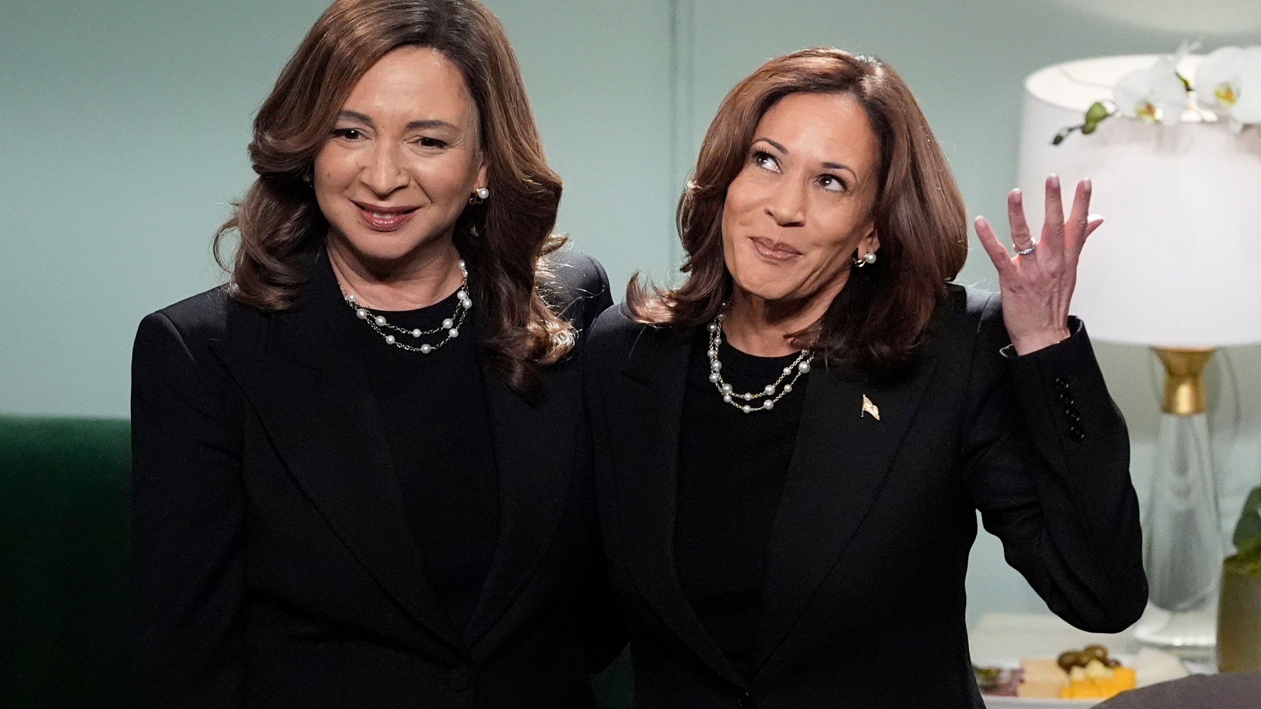 Democratic presidential nominee Vice President Kamala Harris, right, appears on NBC's "Saturday Night Live," with Maya Rudolph, Saturday, Nov. 2, 2024 in New York. Harris has made an unannounced trip to New York to appear briefly stepping away from the battleground states she's been campaigning in with just three days to go before the election. (AP Photo/Jacquelyn Martin)