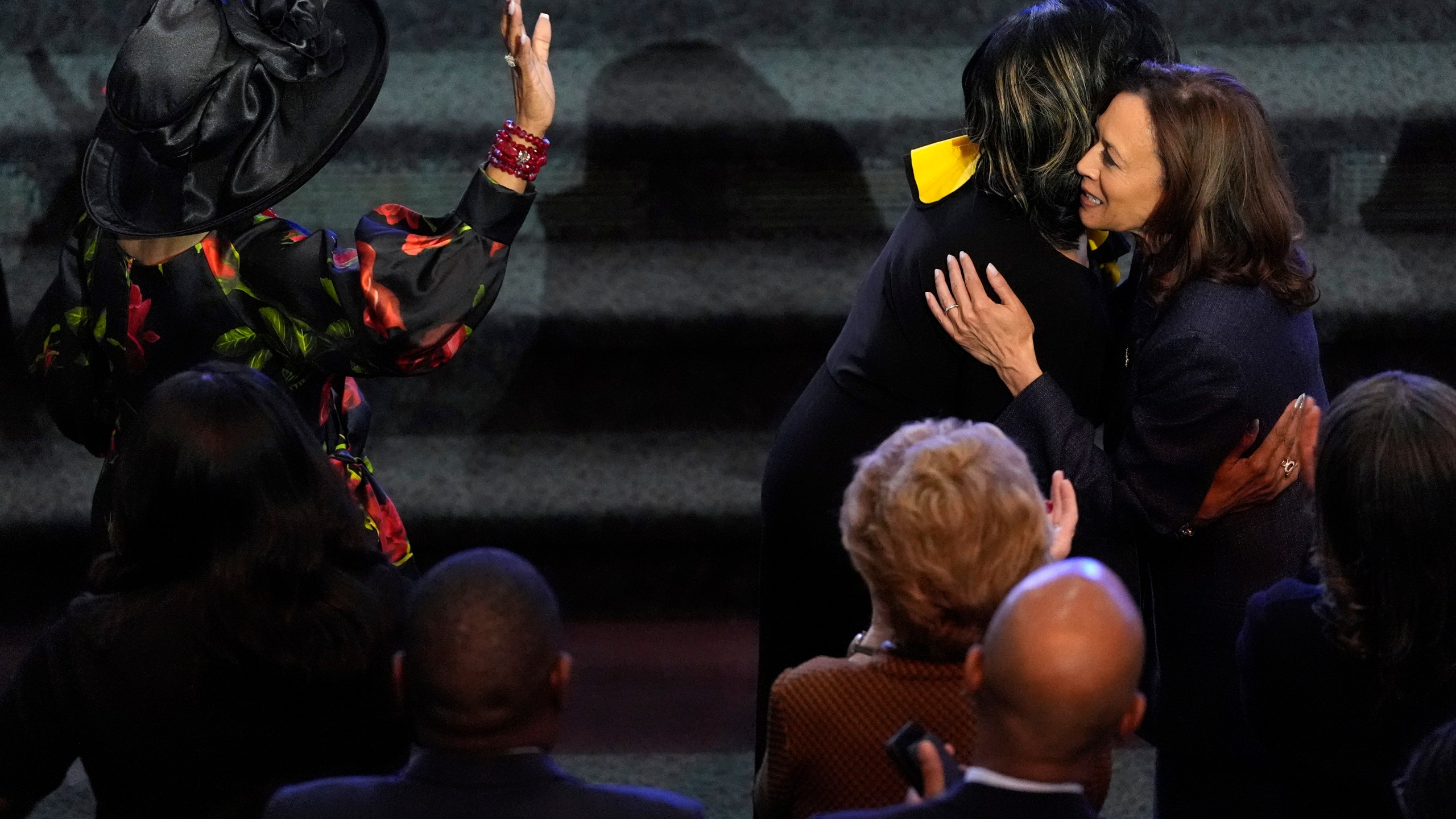 Democratic presidential nominee Vice President Kamala Harris, right, attends a church service at Greater Emmanuel Institutional Church of God in Christ, Sunday, Nov. 3, 2024, in Detroit. (AP Photo/Jacquelyn Martin)