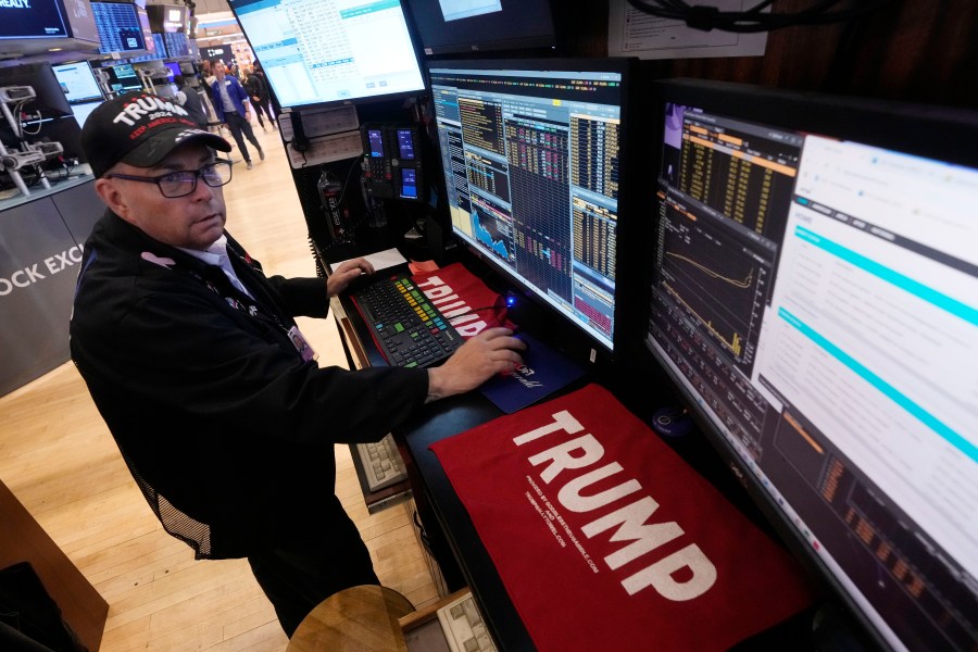 Trader Jonathan Mueller works on the floor of the New York Stock Exchange, Monday, Nov. 4, 2024. (AP Photo/Richard Drew)