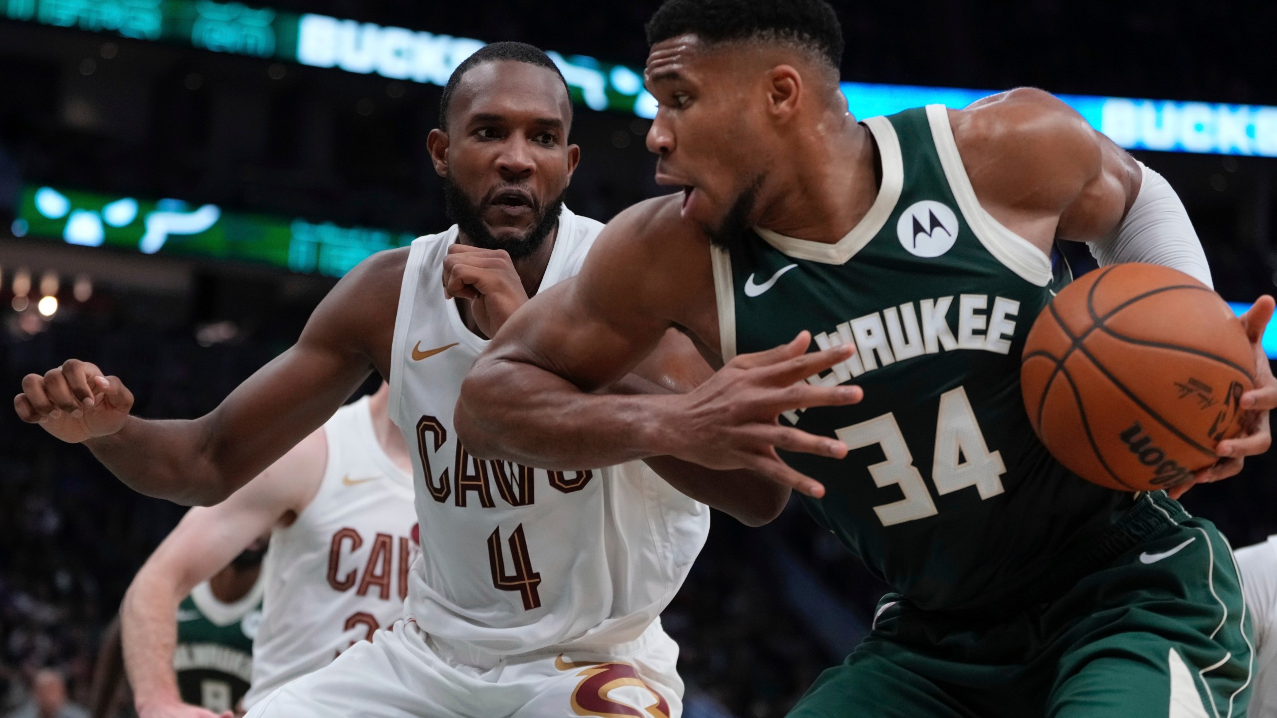 Milwaukee Bucks' Giannis Antetokounmpo tries to get past Cleveland Cavaliers' Evan Mobley during the first half of an NBA basketball game Saturday, Nov. 2, 2024, in Milwaukee. (AP Photo/Morry Gash)