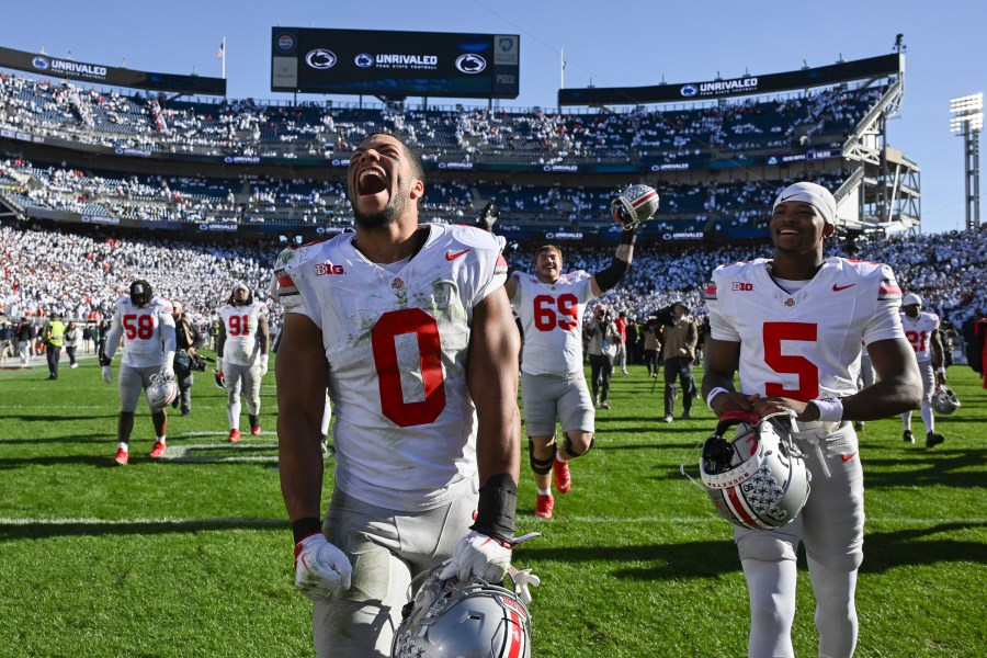 Ohio State linebacker Cody Simon (0) celebrates after defeating Penn State 20-13 in an NCAA college football game, Saturday, Nov. 2, 2024, in State College, Pa. (AP Photo/Barry Reeger)