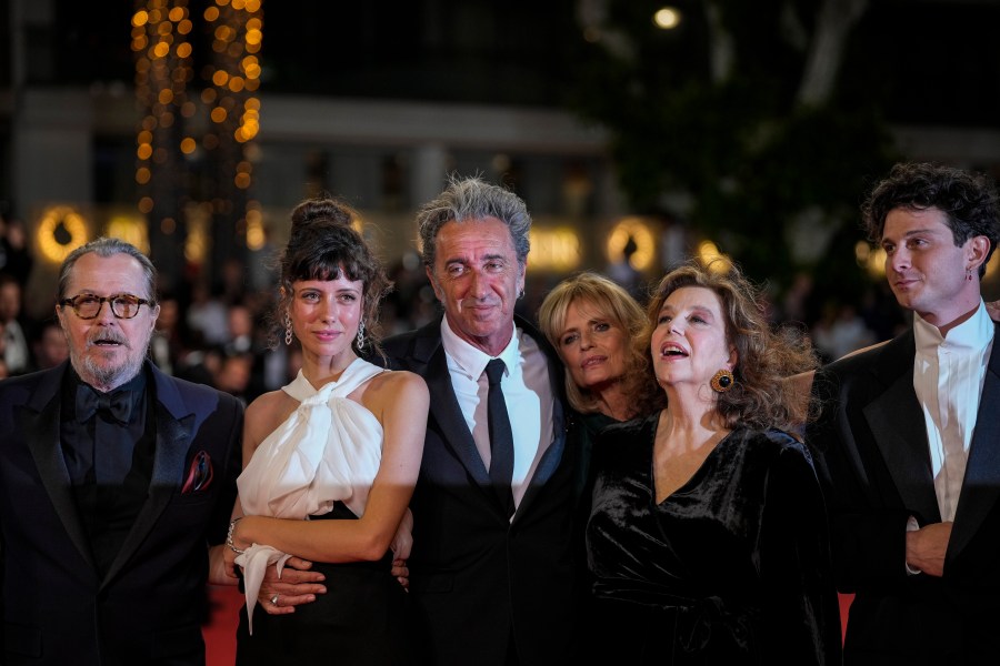 FILE -- From left, Gary Oldman, Celeste Dalla Porta, director Paolo Sorrentino, Isabella Ferrari, Stefania Sandrelli, and Daniele Rienzo pose for photographers upon arrival at the premiere of the film 'Parthenope' at the 77th Cannes International Film Festival, in Cannes, southern France, Tuesday, May 21, 2024. (Photo by Andreea Alexandru/Invision/AP)