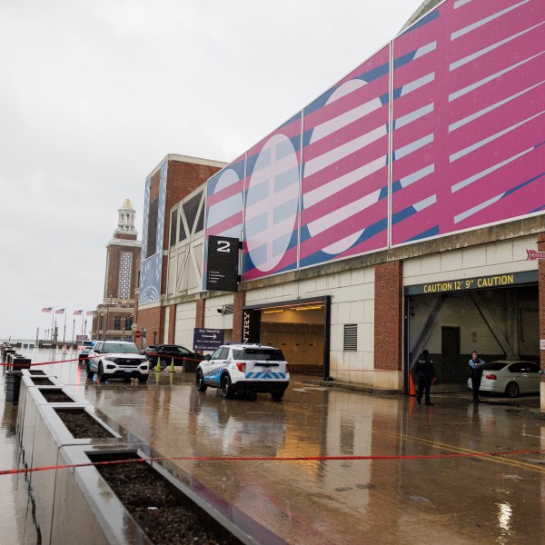 Police investigate the scene of a shooting at the Navy Pier, Tuesday, Nov. 5, 2024 in Chicago. (Anthony Vazquez/Chicago Sun-Times via AP)