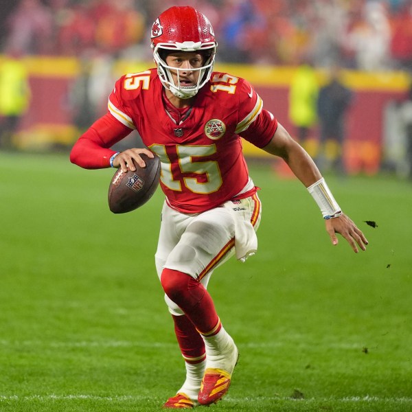 Kansas City Chiefs quarterback Patrick Mahomes (15) runs out of the pocket against the Tampa Bay Buccaneersduring the second half of an NFL football game, Monday, Nov. 4, 2024, in Kansas City, Mo. (AP Photo/Charlie Riedel)