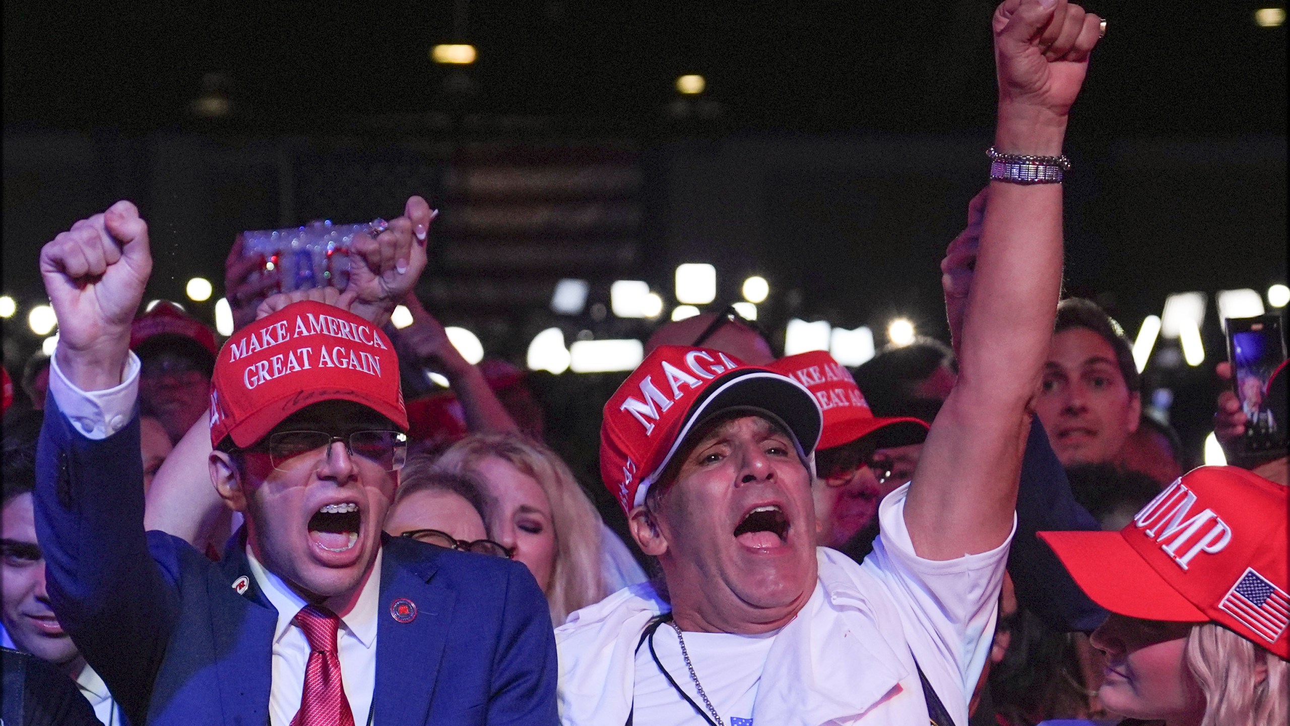 Supporters arrive at an election night watch party for Republican presidential nominee former President Donald Trump Tuesday, Nov. 5, 2024, in West Palm Beach, Fla. (AP Photo/Evan Vucci)